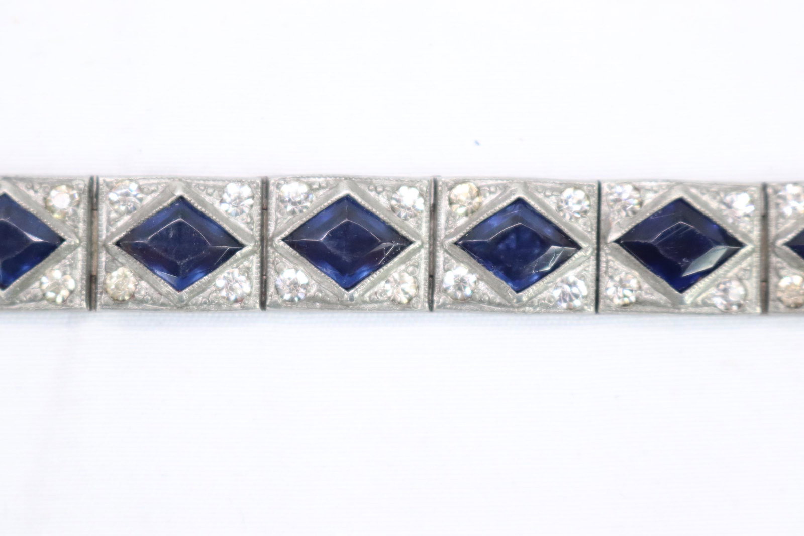 Antique Art Deco Bracelet With Sapphire-Colored Stones: and rhinestones, approx. 7.5"