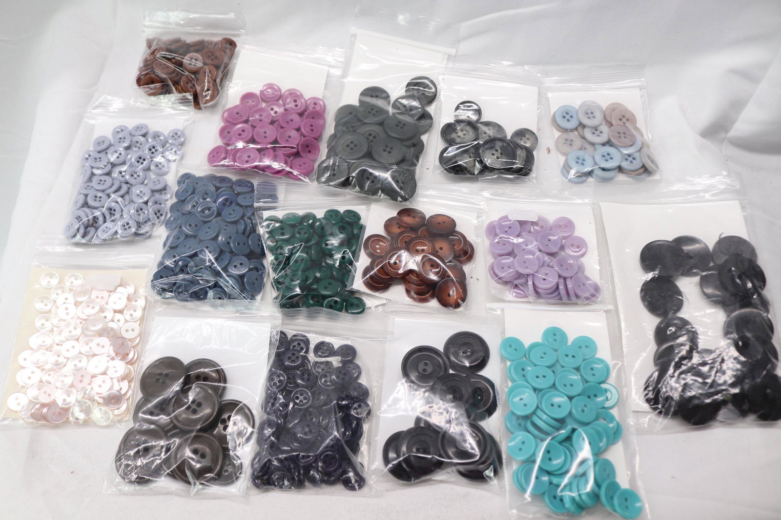Lot of Large Quantity, Old Stock Clothing Buttons: Various colors and sizes, see photo's