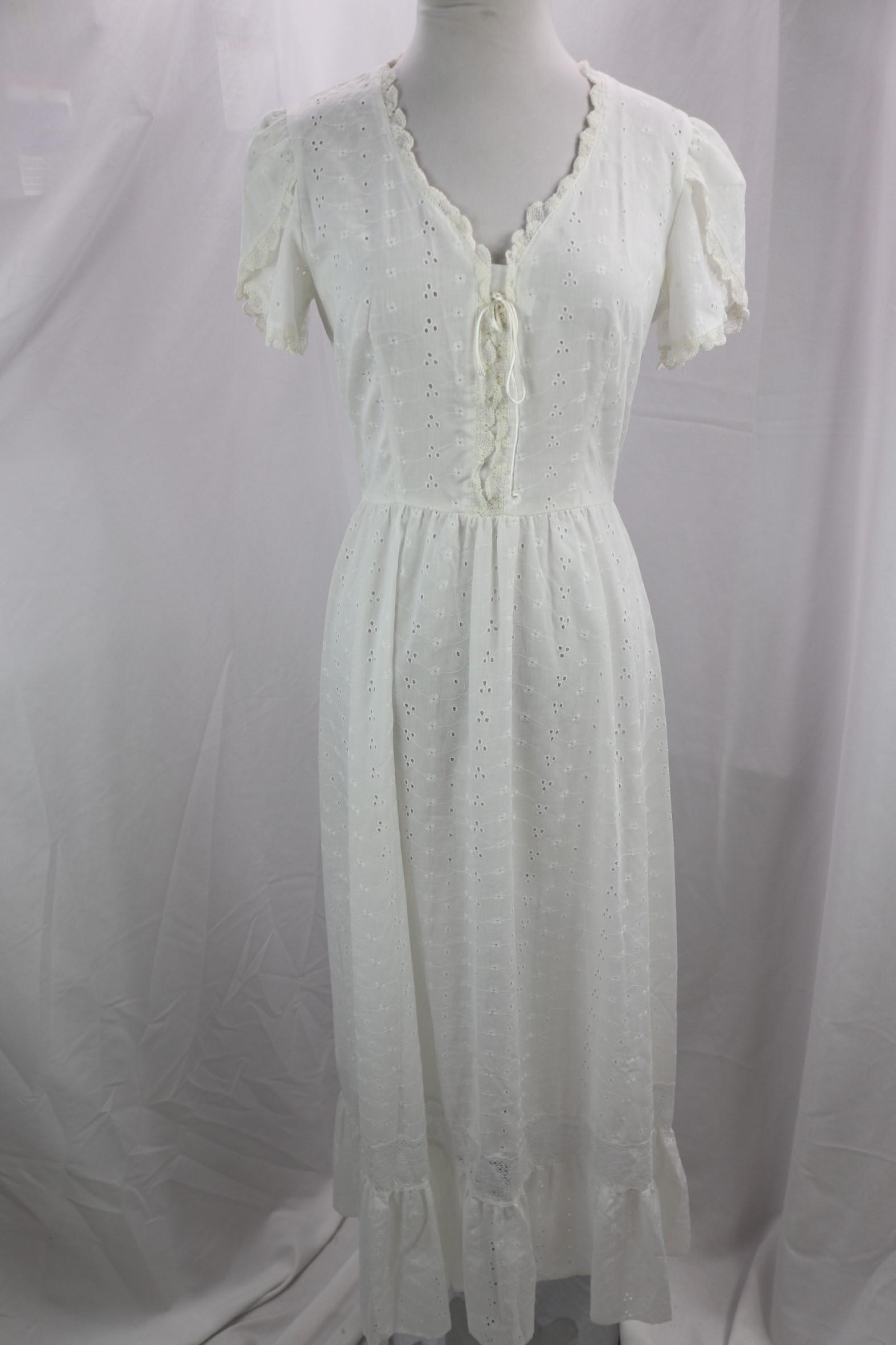 Vintage 1970's White Eyelet Dress by Cathy Sue: poly rayon blend but feels like cotton, good condition, see photo's, approx. 36 bust, 28 waist