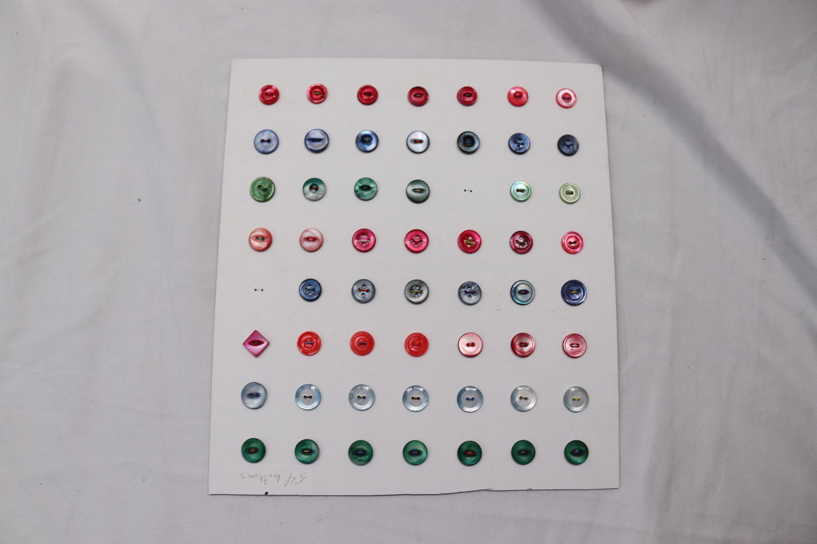 Lot of Antique Colored Mother of Pearl Buttons: various sizes, some sets