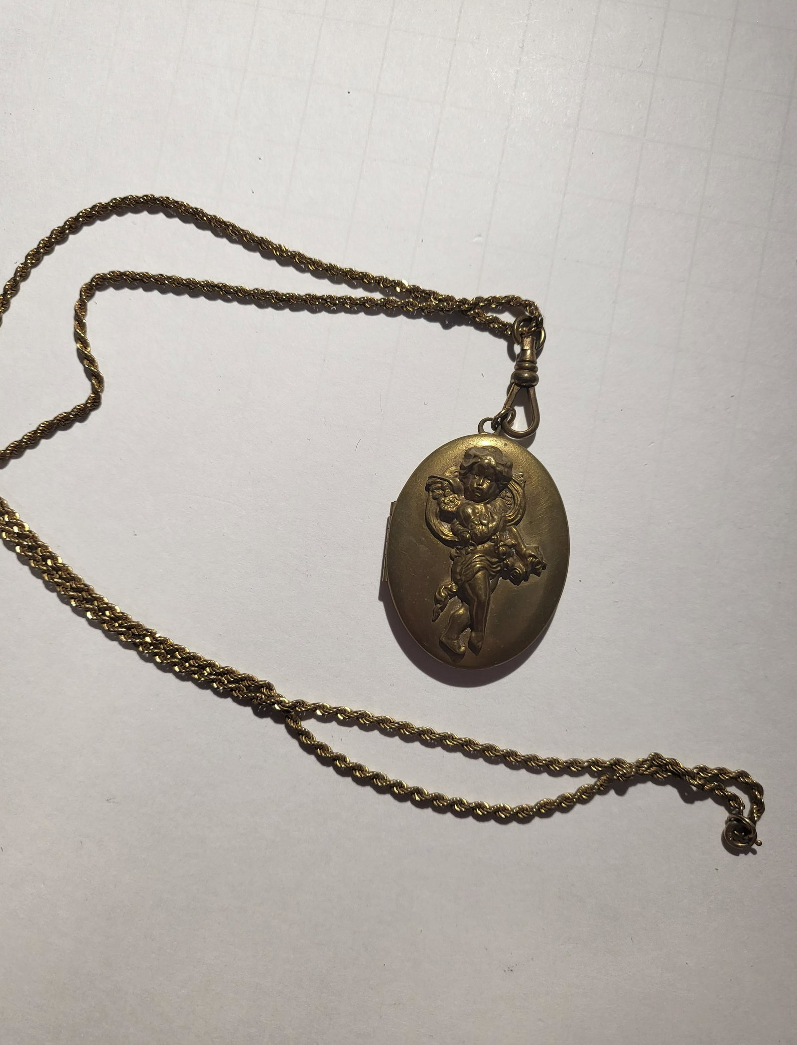 Vintage Locket with Cherub: approx. 1 1/2 inch locket, 25 inch chain