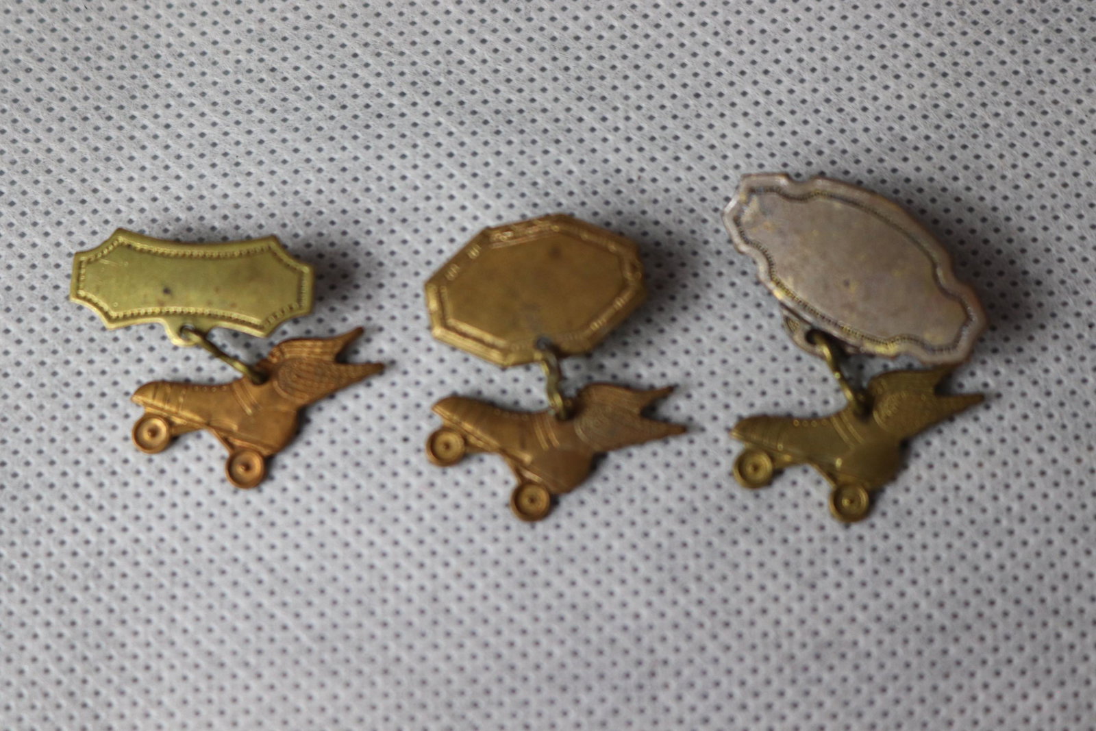 Vintage 1940's Roller Skate With Wings Brooches: lot of 3, approx. 1 inch