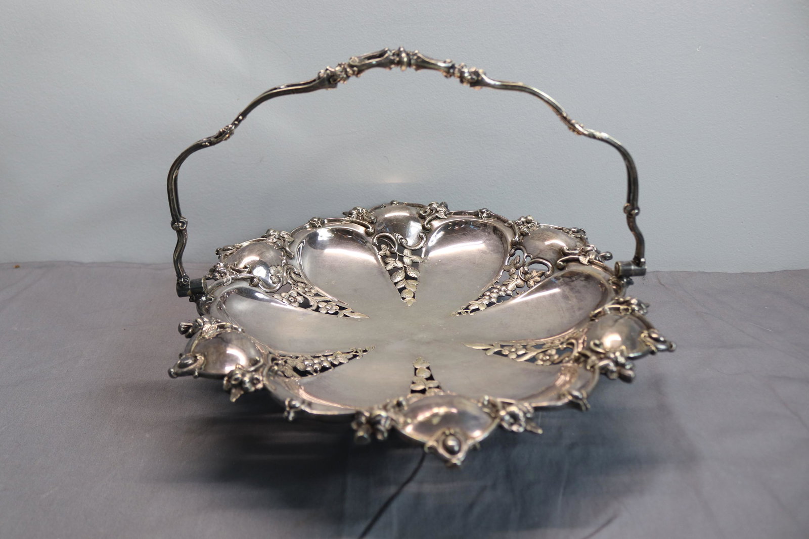 Victorian Silver Plate Brides Basket with Strawberry, grape & Floral Detail: see photo's, approx. 3 tall, 11 wide not including the handle, one side of handle is loose