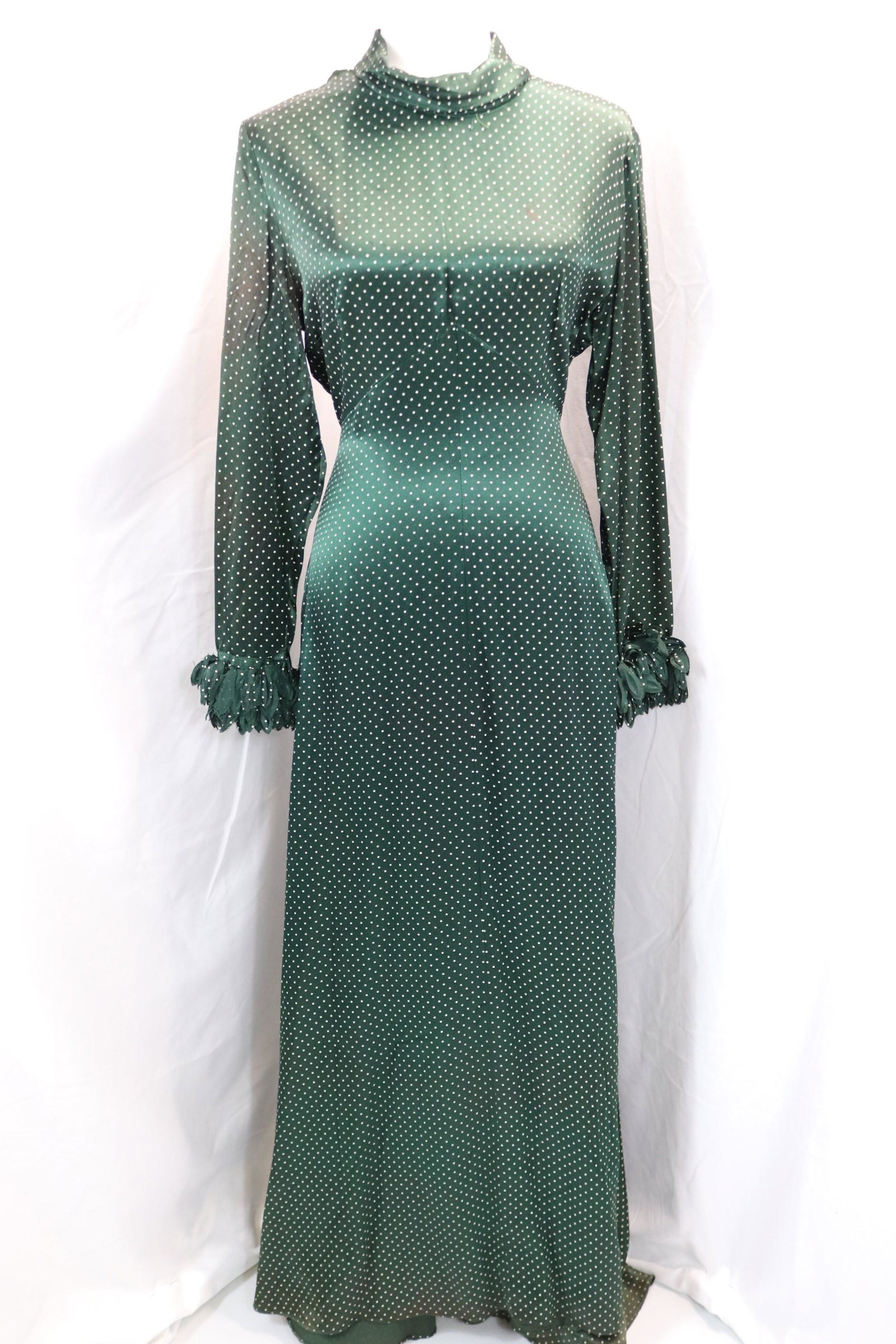 vintage 1970's green polka dot maxi dress with fringed cuffs: approx. 38 bust, 30 waist, small wear spot on shoulder, discoloration under arms & sleeves, see photos