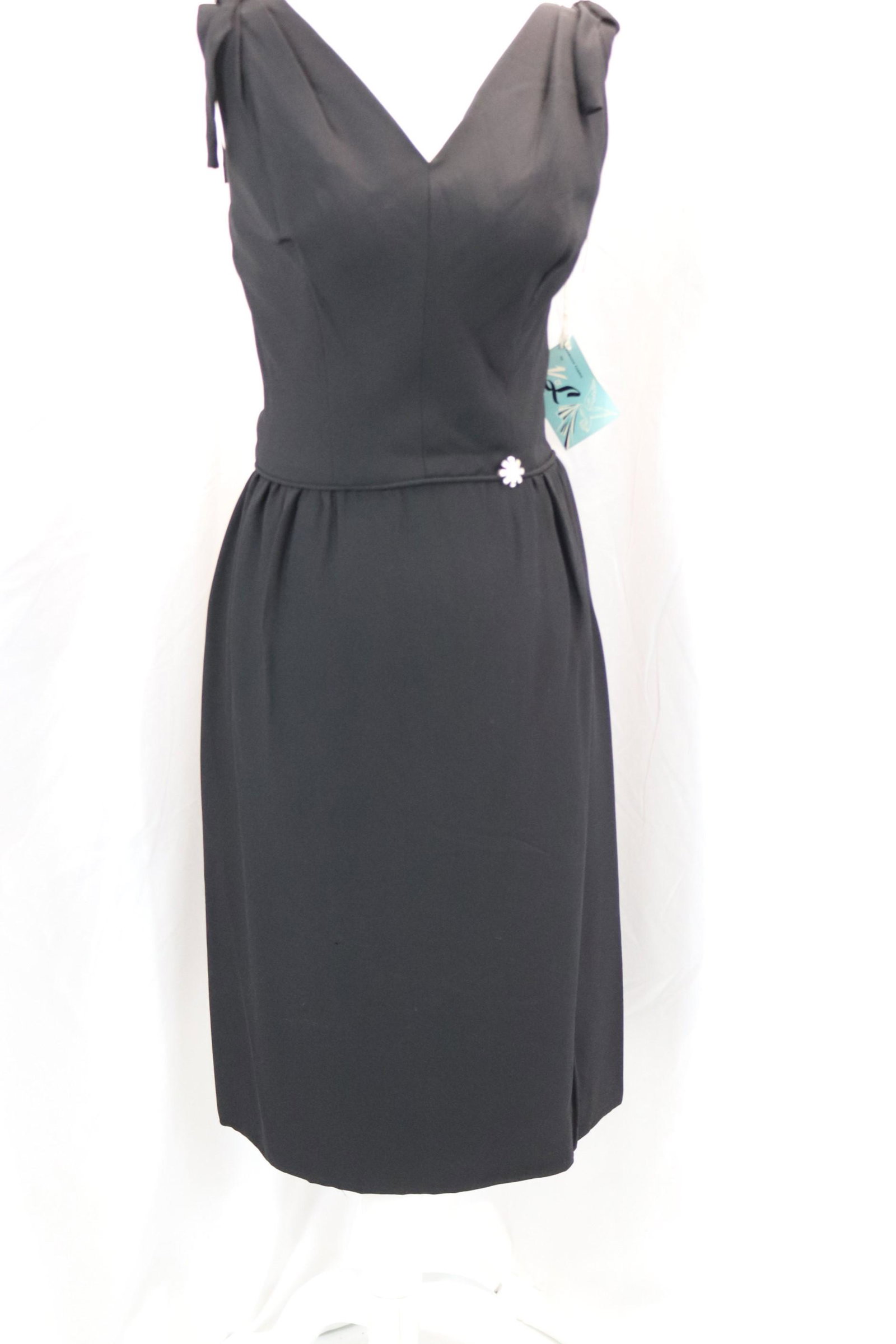 vintage 1960's K&L black sheath cocktail dress: approx. 34 bust, 26 waist, old store stock with original tags, good condition, see photos