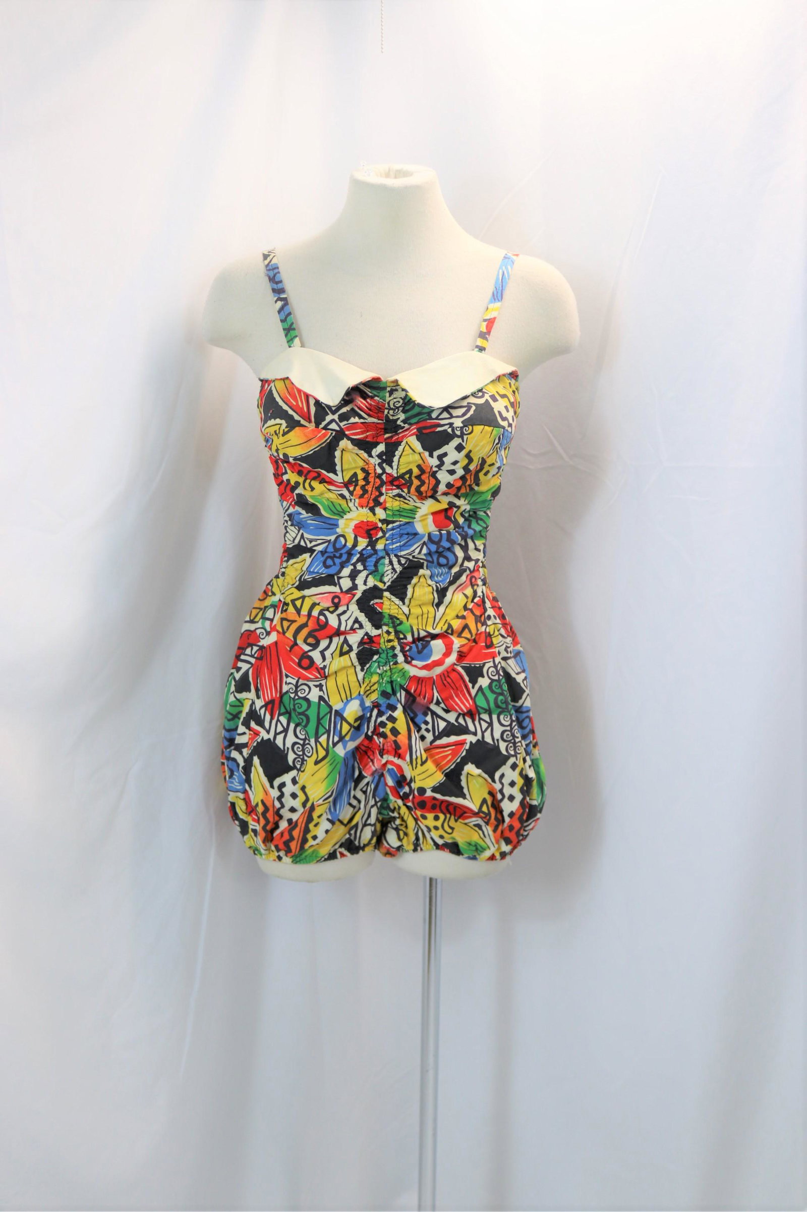 vintage 1940's abstract cotton smocked bathing suit: size 36, 23-28 elastic waist, slight soiling on collar otherwise good condition, see photos