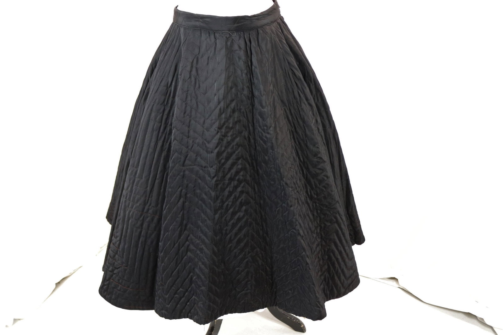 vintage 1950's black quilted circle skirt: approx. 27 waist, good condition, see photos