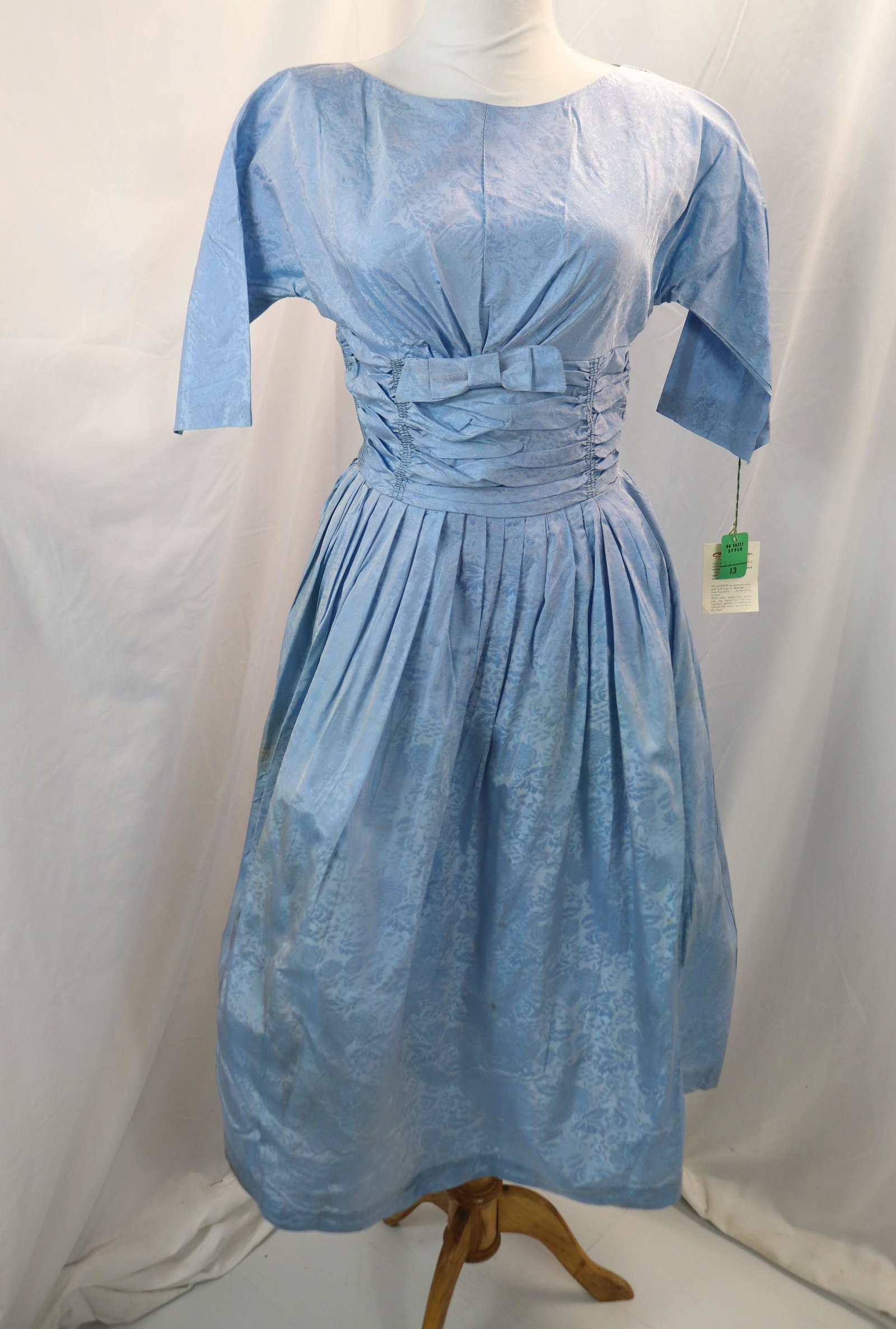 vintage 1950's old store stock light blue acetate damask party dress: approx. 32 bust, 28 waist, some storage soil, tiny holes at hem with original tags, see photos