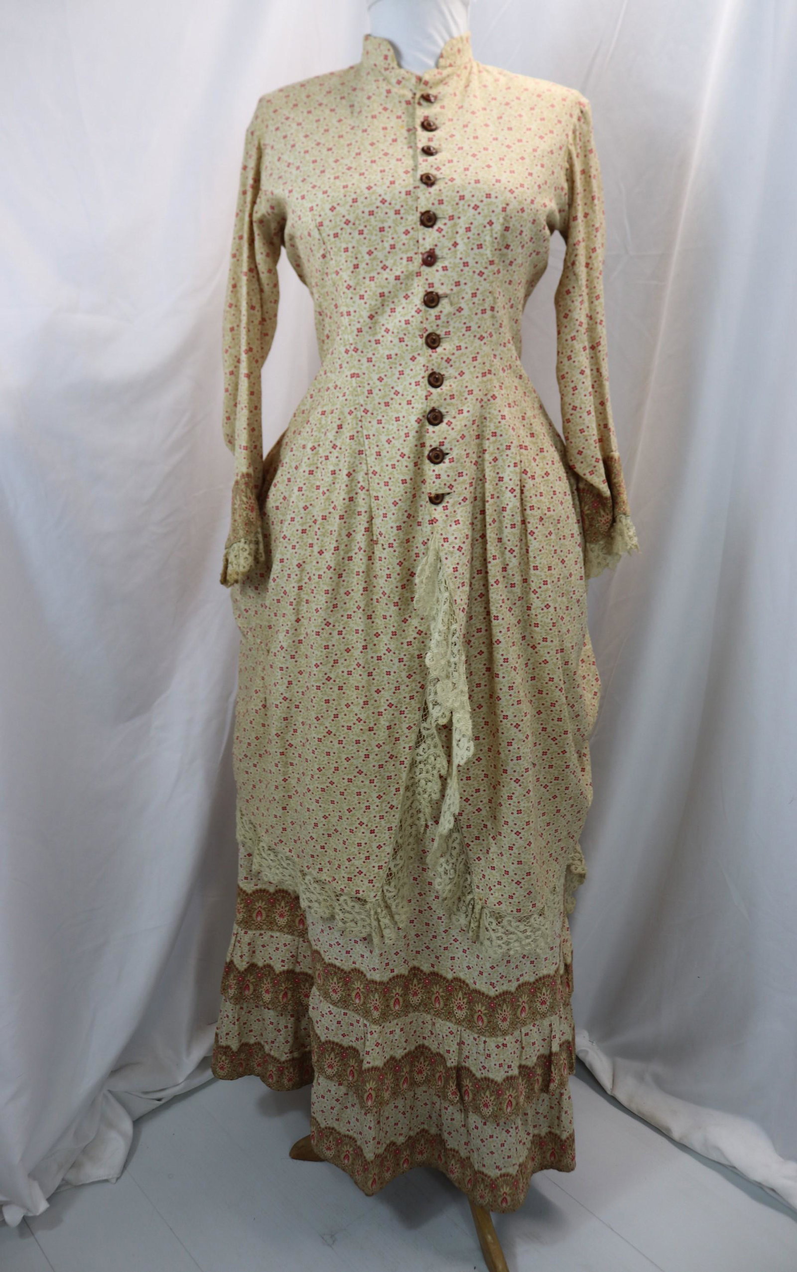antique 1870's off white & red calico print bustled bodice & skirt: approx. 32 bust, 24 waist, small seam repair needed, one broken button otherwise in good condition, see photos