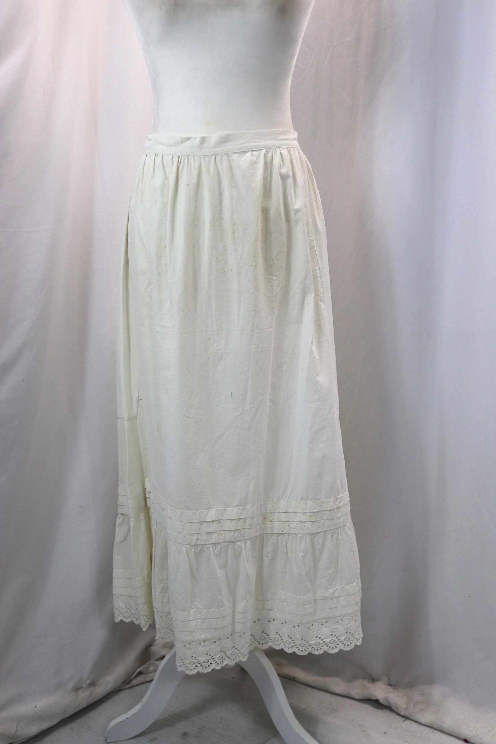 Victorian White Cotton Petti Coat with Eyelet Hem: approx. 28 waist, small dot stains, looks as if it was hemmed and let down again, see photo's