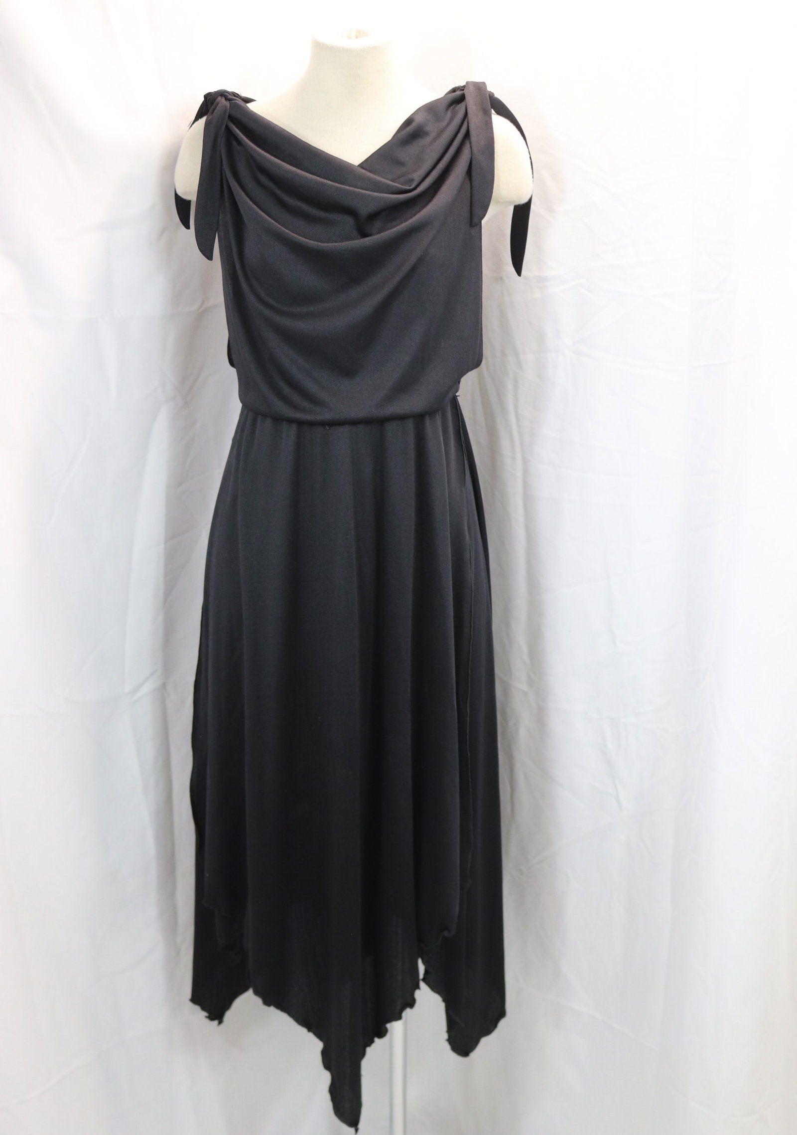 Vintage 1970's Black Poly Knit Handkerchief Hem Evening Dress: approx. 36 bust, 28 waist, good condition, see photo's