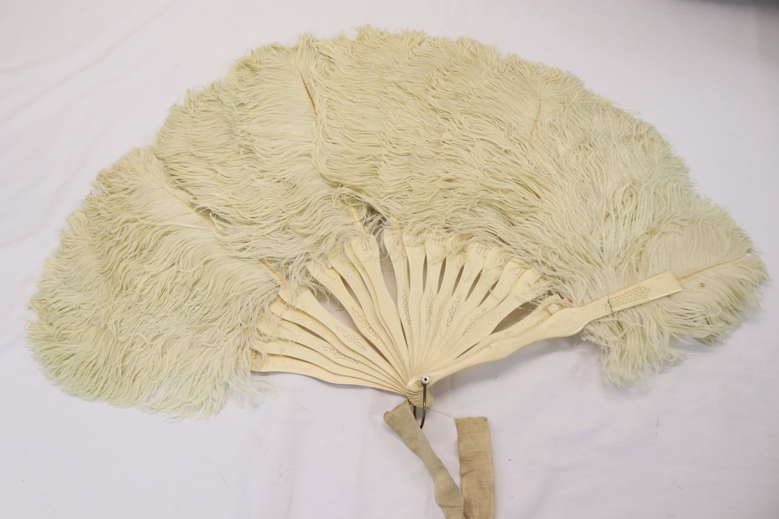 Antique Bone Carved & Ostrich Feather Ladies Hand Fan: needs ribbon to be replaced see photo's
