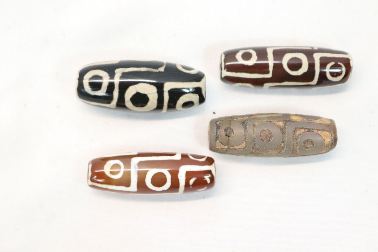 Lot of 4 Tibetan 9 Eye DZI Beads, one Hand Carved (1 of 5)