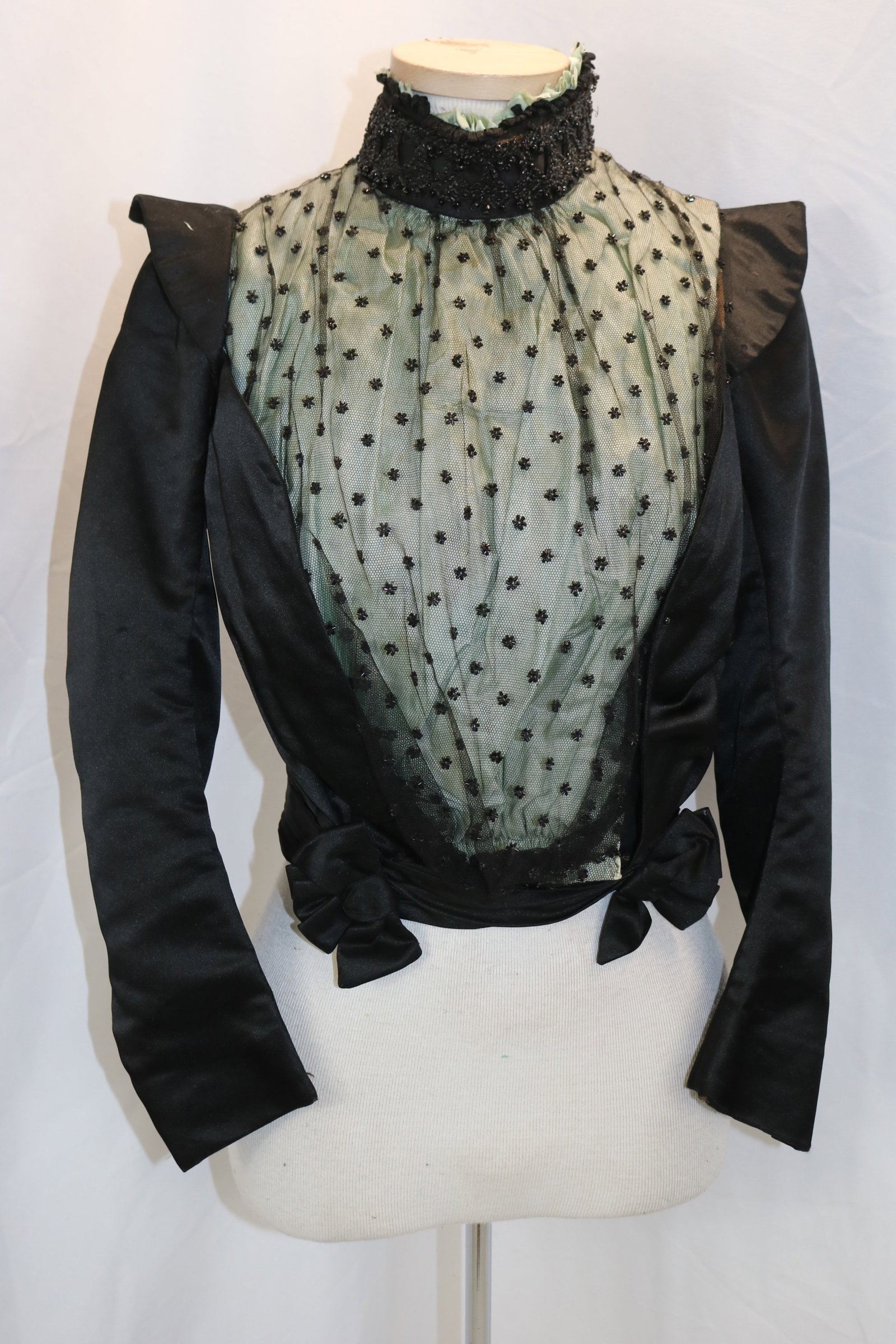 Victorian Black Silk Bodice with Netting & Black Jet beading: approx. 28 bust, 22 waist, fraying of blue silk at collar, some holes in lining, see photo's