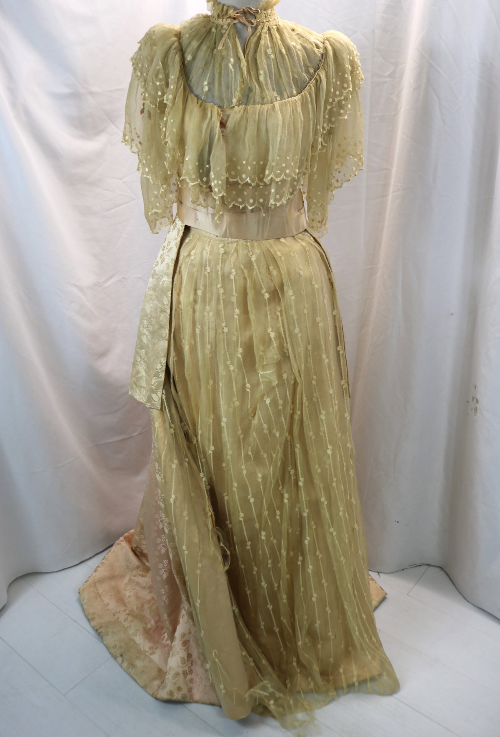 Antique mid 1800's dress pink brocade with silk lace: approx. 28 bust, 26 waist, originally pink, faded throughout to give it an ombre look, some silk fray, fray and damage, some lace fray throughout, see photo's