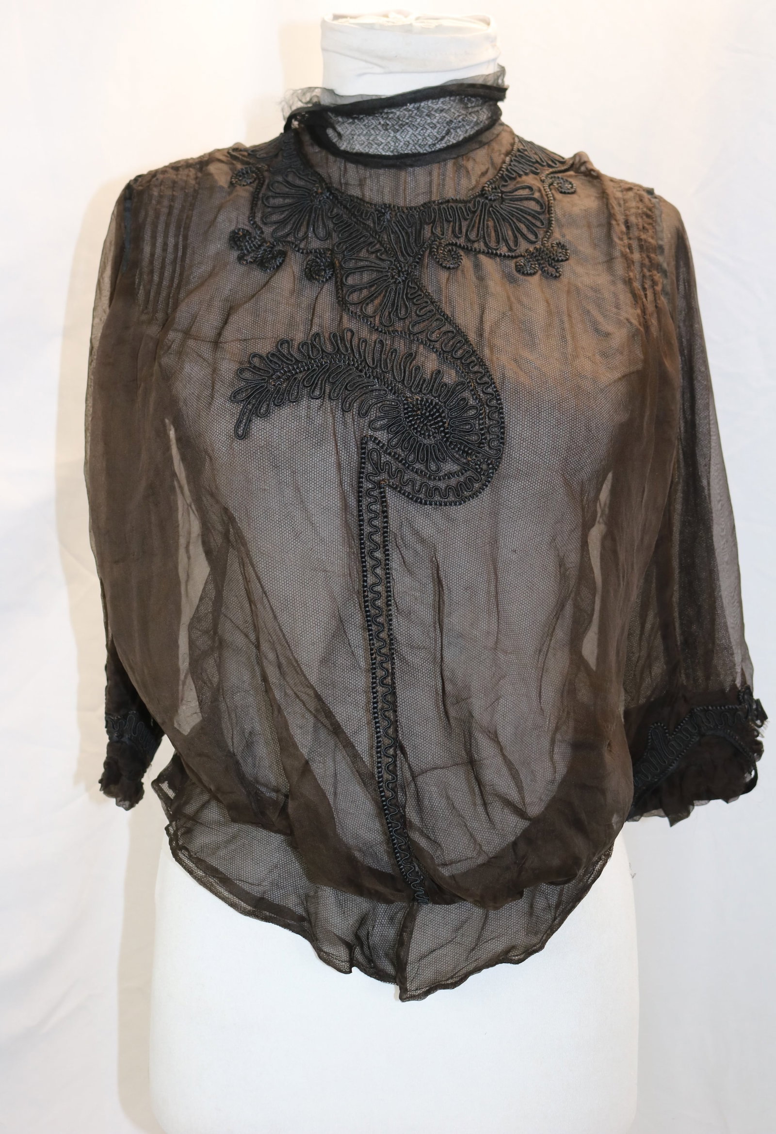 Edwardian black net bodice with corde trim: approx. 30 bust, 24 waist, trim on sleeve needs repair, has some small tiny holes & silk fray, see photo's