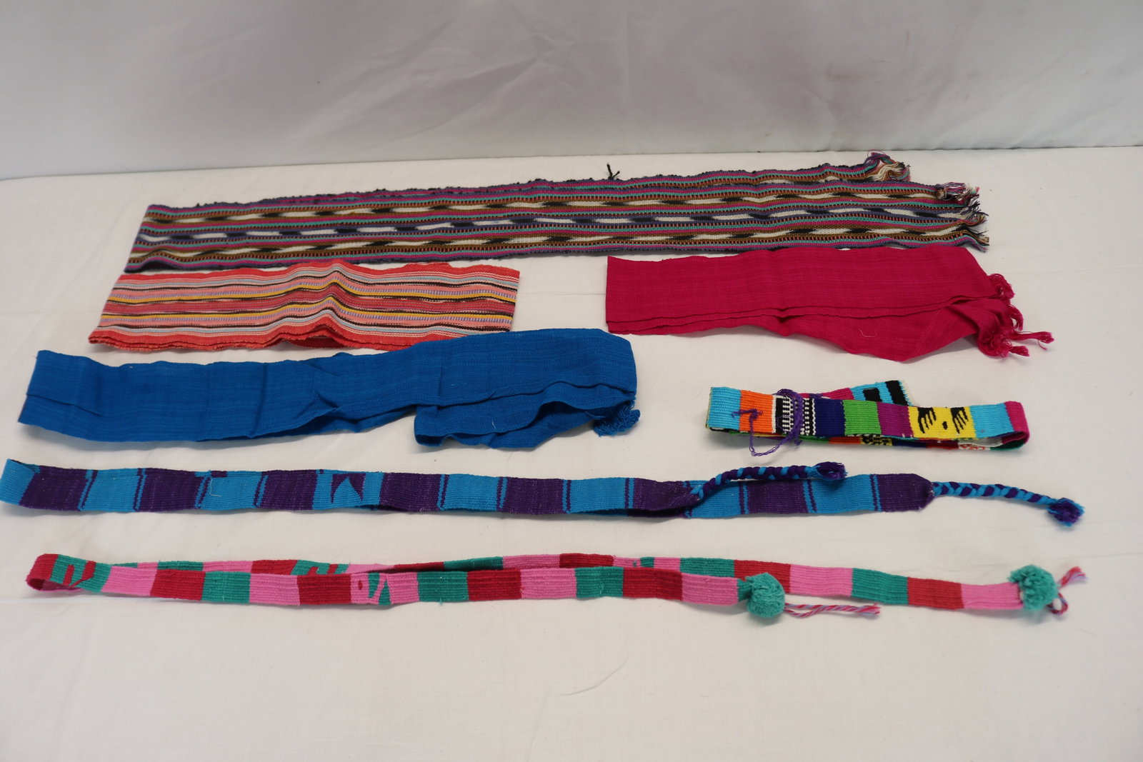 Lot of 7 Vintage Woven Mexican Style Tie Belts: good condition, see photo's