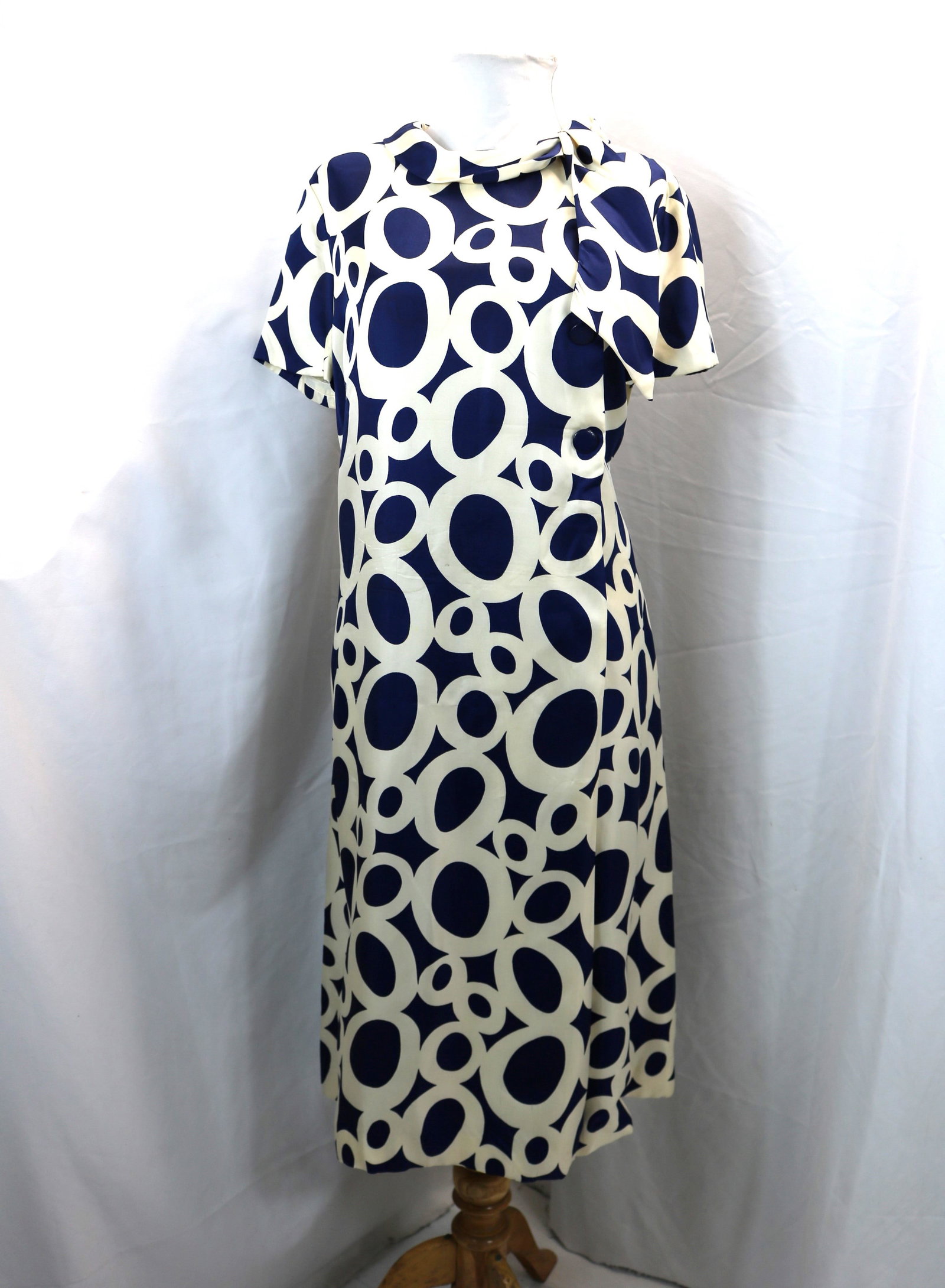 Vintage 1960's Richard Kaplan Navy Blue & Beige Circle Print Cocktail Dress: approx. 40 bust, 38 waist, has some under arm discoloration, back darts have been let out, some pulls, and stain, see photo's