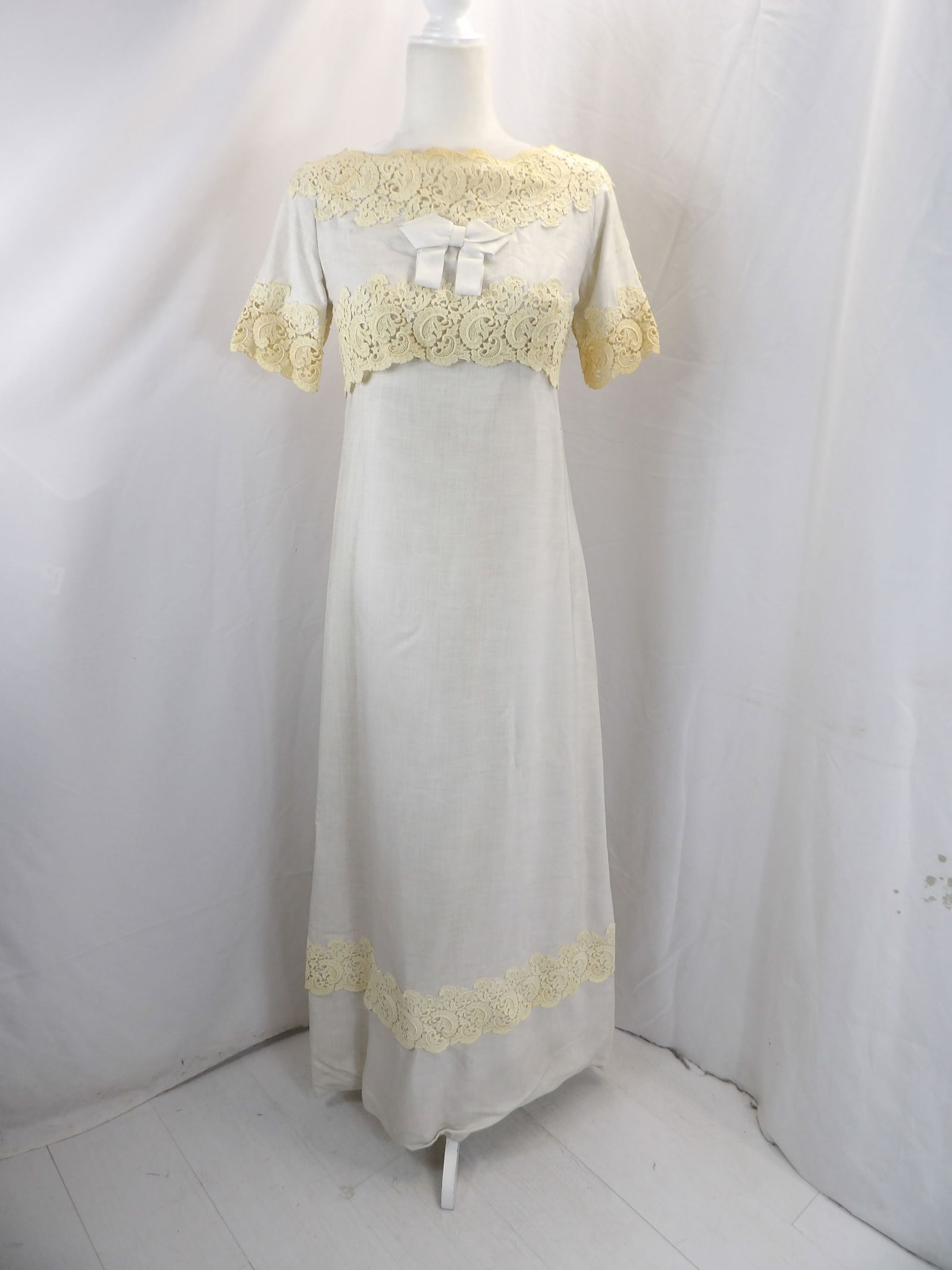 VINTAGE1960'S ALFRED ANGELO TAN LINEN & LACE GOWN: APPROX. 34 BUST, 30 WAIST. A COUPLE OF BROWN DOTS AND PIN HOLE ON SHOULDER. SEE PHOTOS.