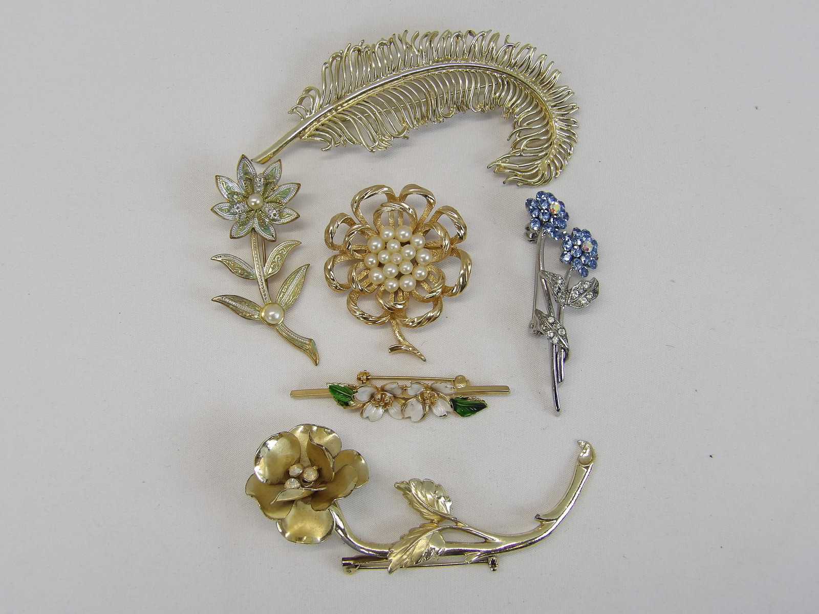 Lot of 6 Vintage Flower Brooches, Trifari, Coro, & other Signed: see photo's