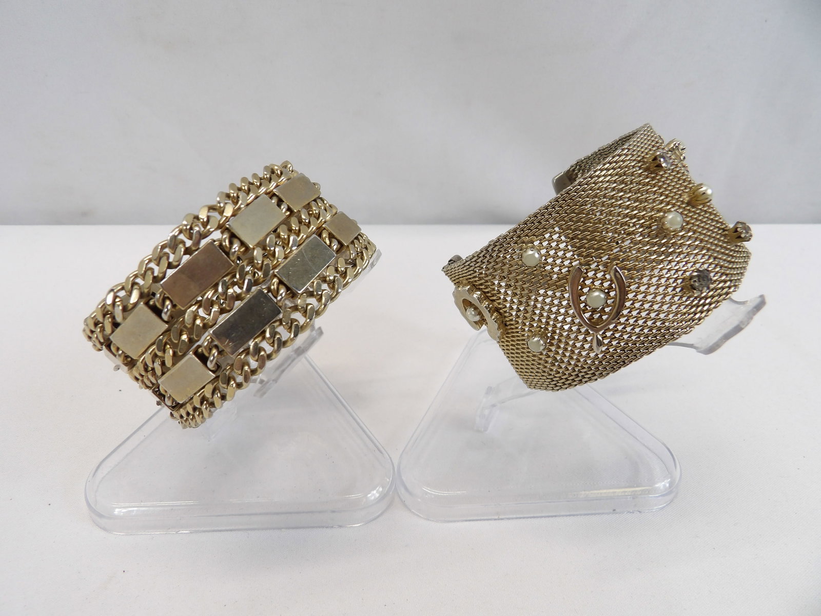 Lot of 2 Vintage Wide Band Gold Tone Bracelets 1 with Charms for Luck: see photo's
