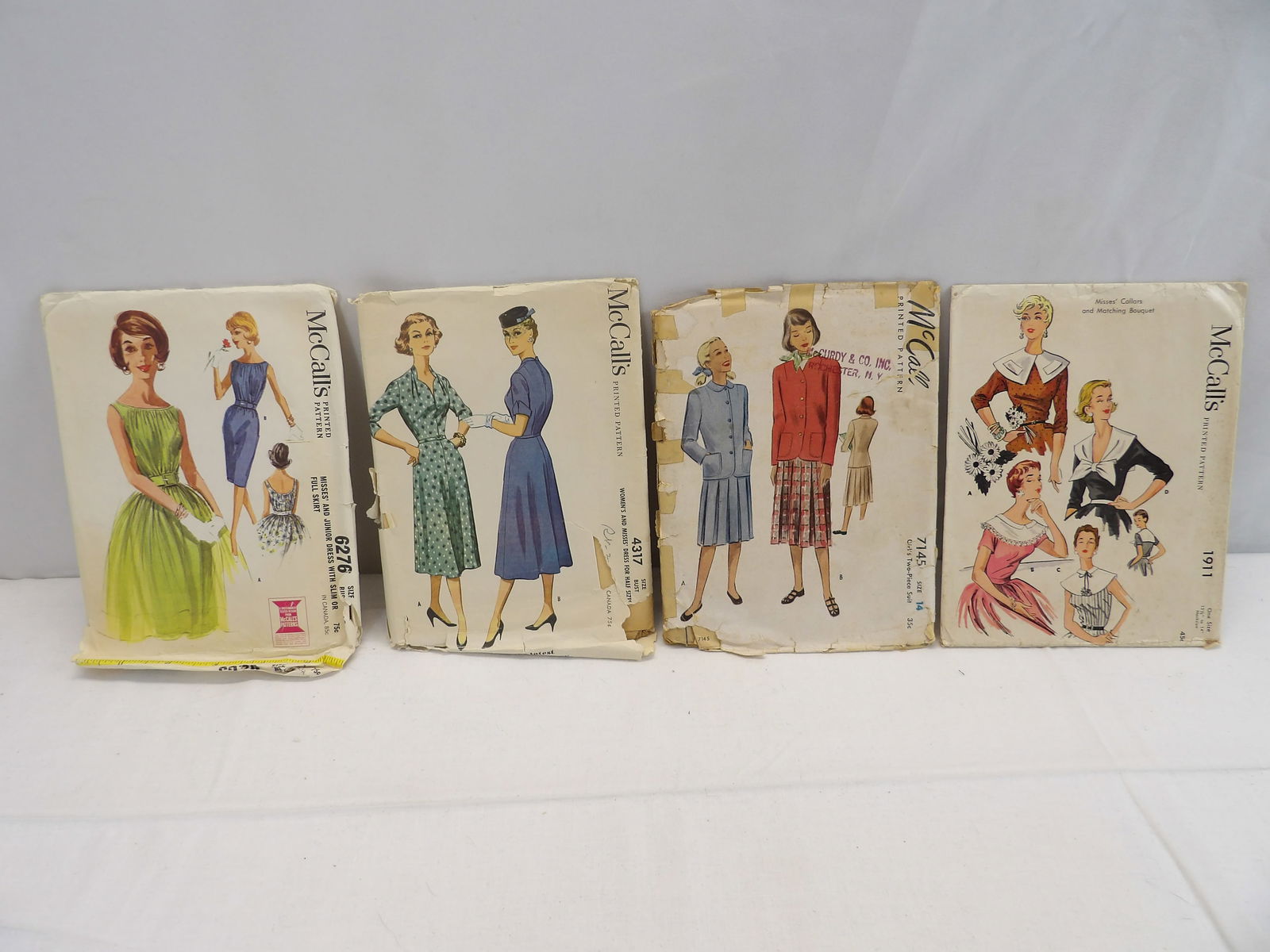 Lot of 4 McCall's Dress Patterns, 1962, 1954, 1947 & other 1940's: appear to be intact, see photo's