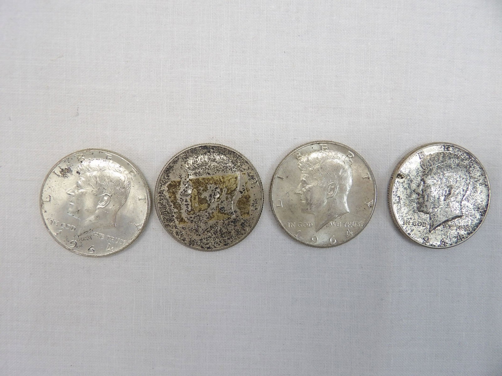 Lot of 4 Silver Kennedy Half's 1964: see photo's