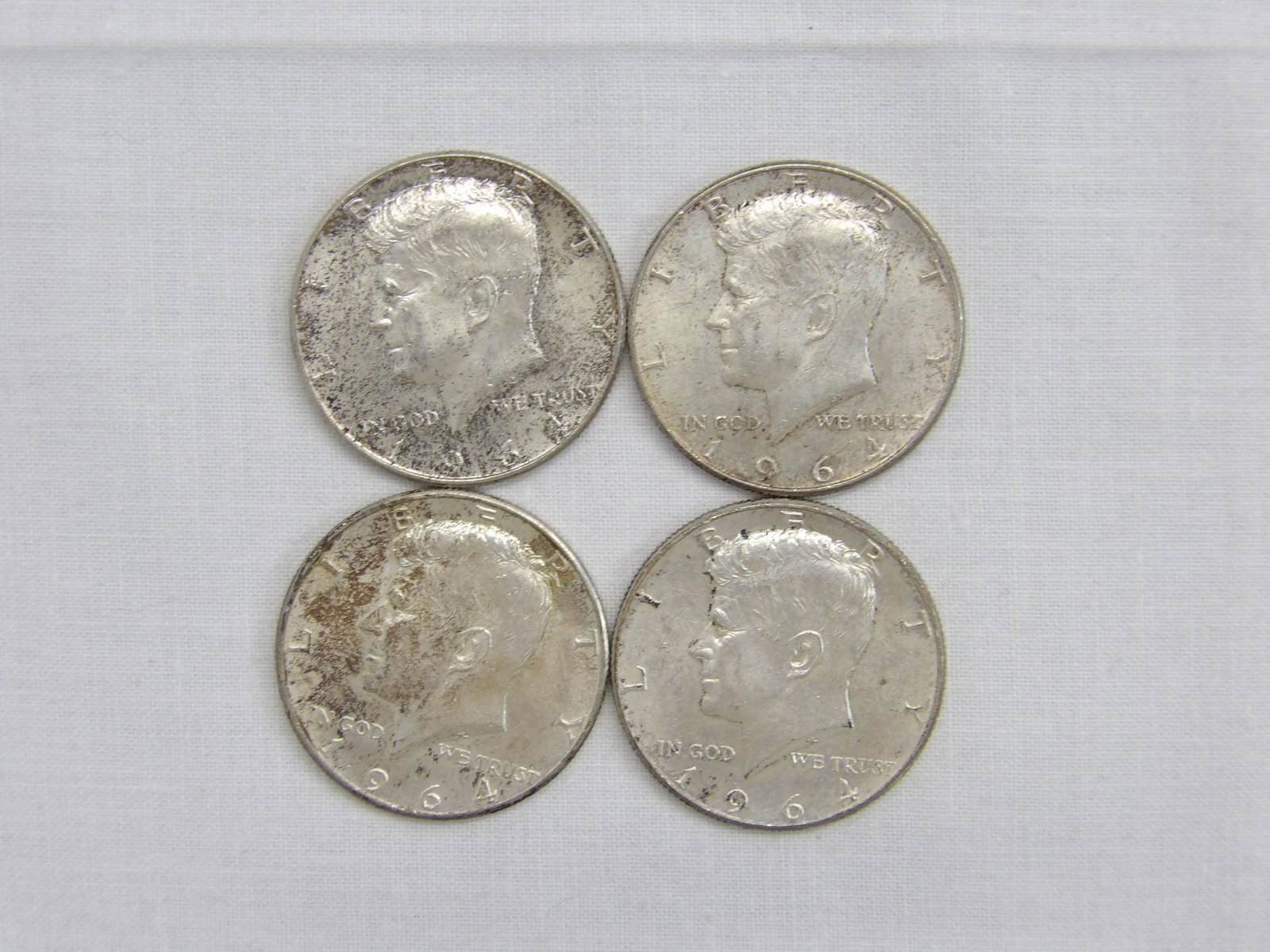 Lot of 4 Silver Kennedy Half's, 1964: see photo's