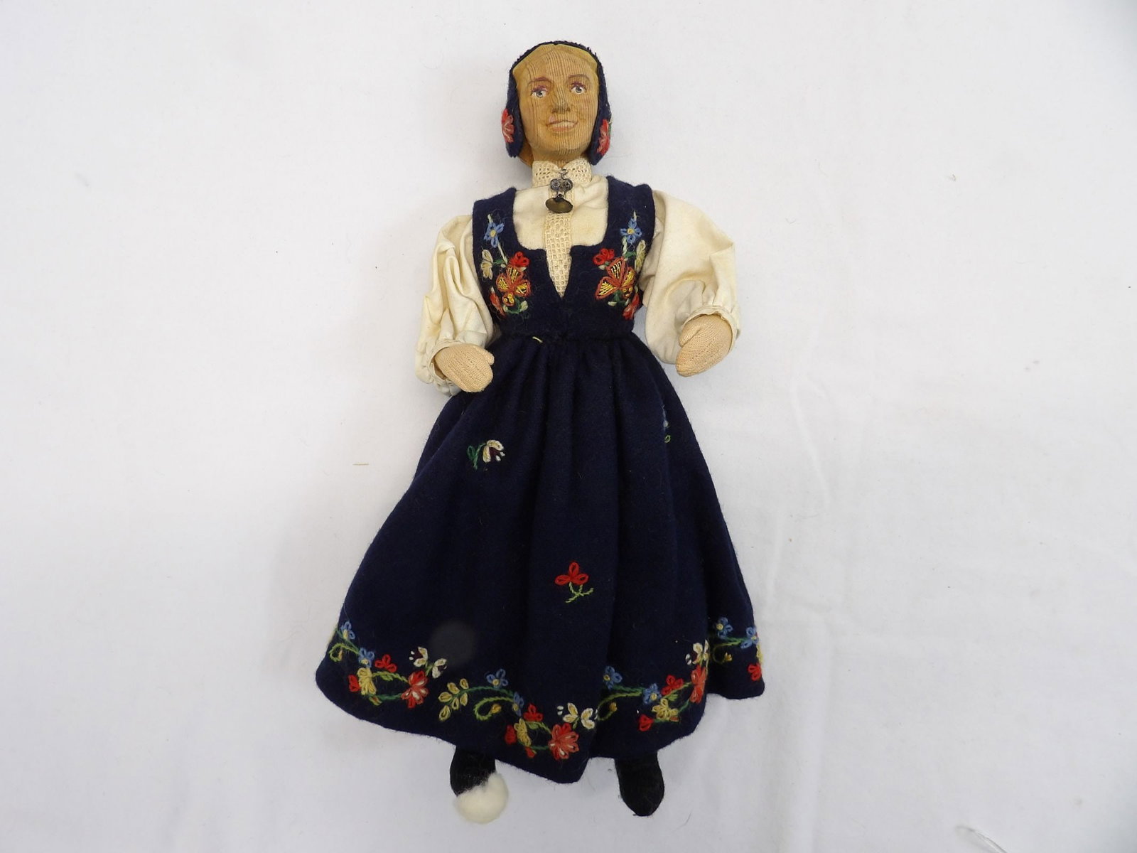 Antique Carved Wood Head Swiss Doll with Embroidered Dress: approx. 11 inches tall, original cost $82.50