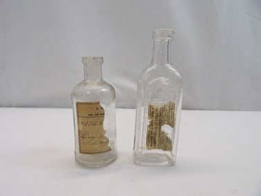 Lot of 2 Antique Bottles, Listerine & Dr. Seth Arnold's Balsam