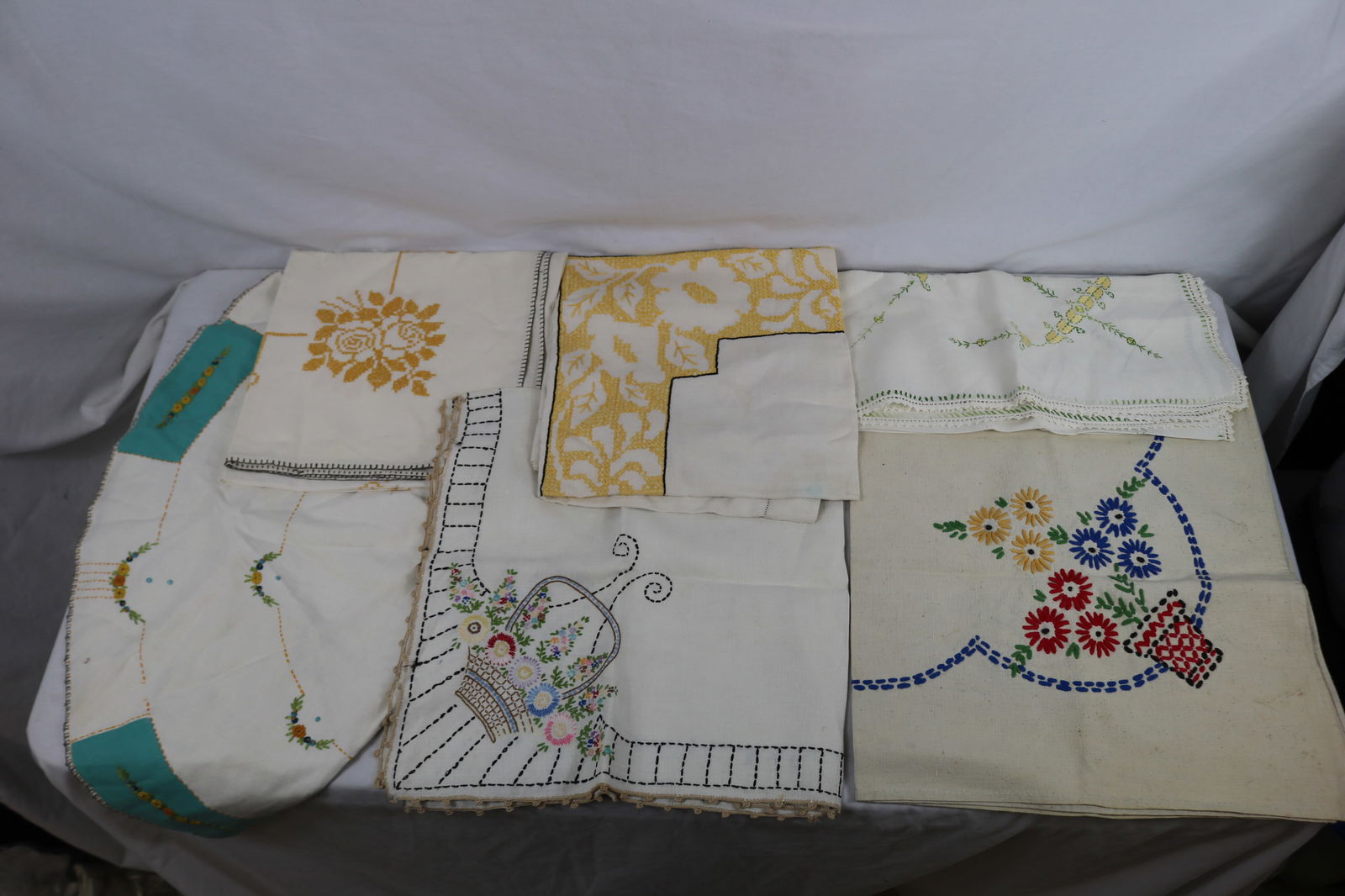 Lot of 5 Vintage Embroidered Tablecloths: see photo's