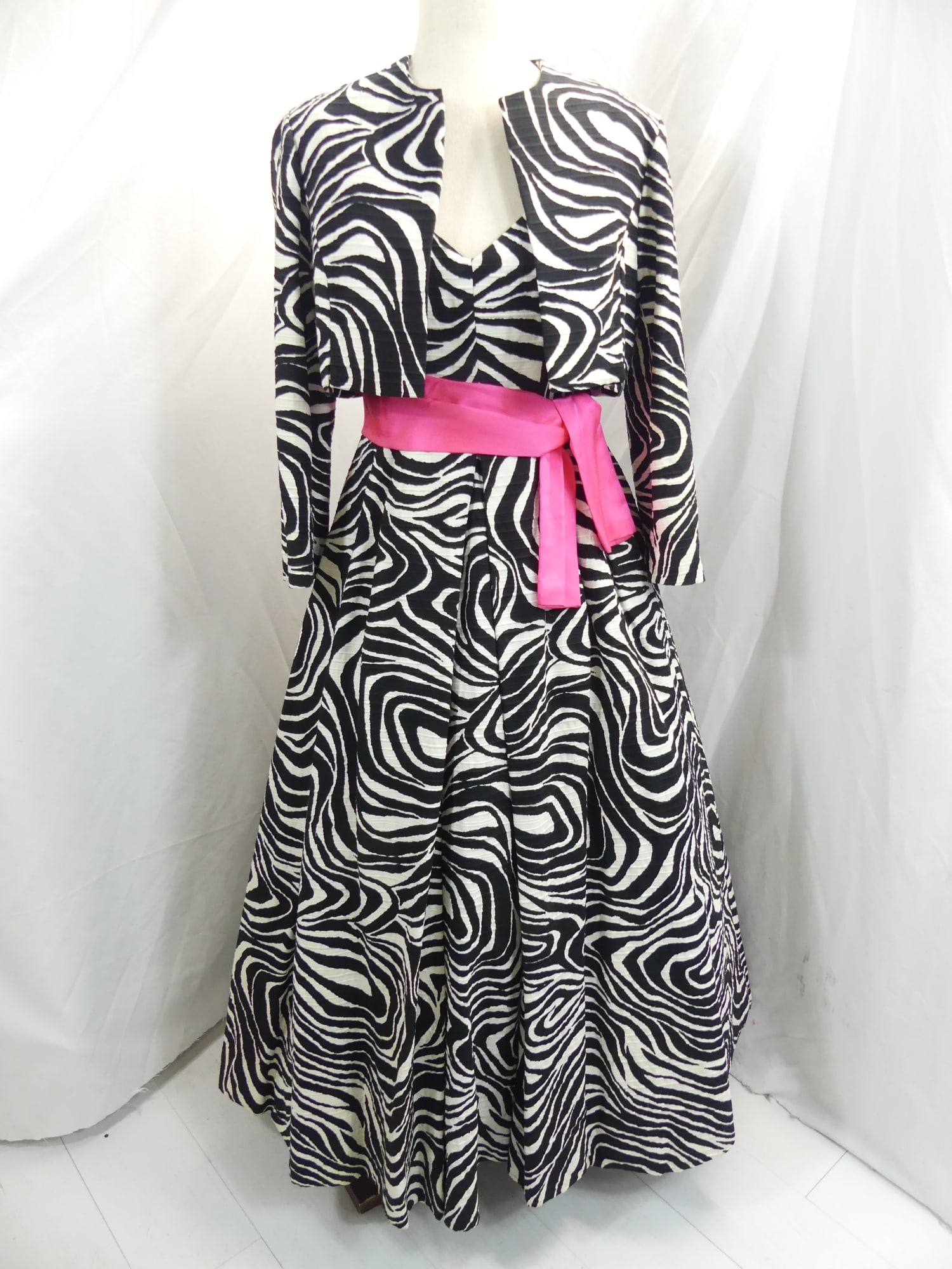 Vintage 1960's Mam 'Selle By Betty Carol Black & White Gown & Jacket Set with Pink Sash: approx. 34 bust, 27 waist. Some light underarm discoloration, light discoloration on neckline & some spots at lower part of the dress, see photo's