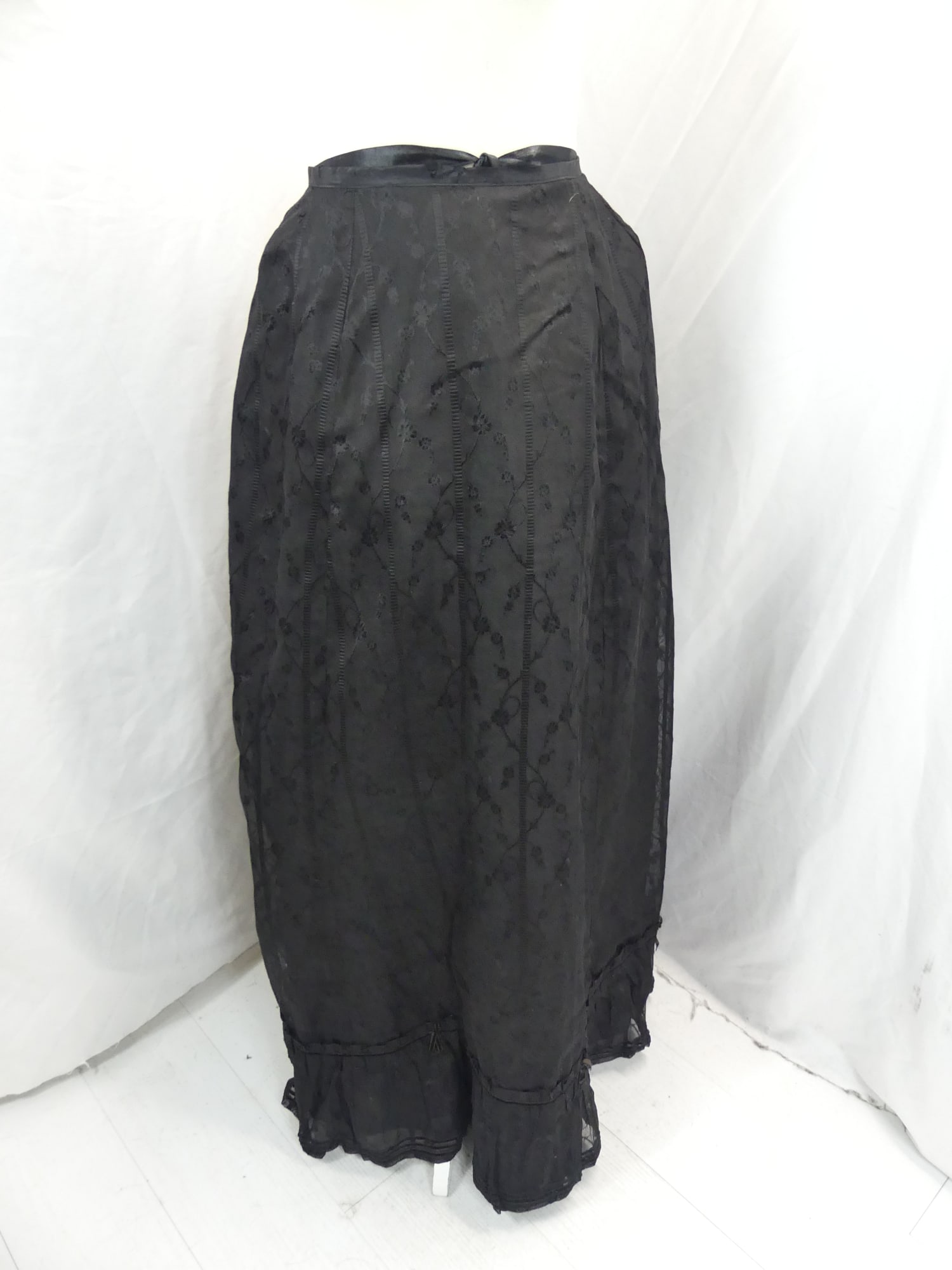 Antique 1800's Black on Black Silk Floral Bustle Skirt: approx. 23 waist. A couple of tiny holes & one hard to find slit, see photo's