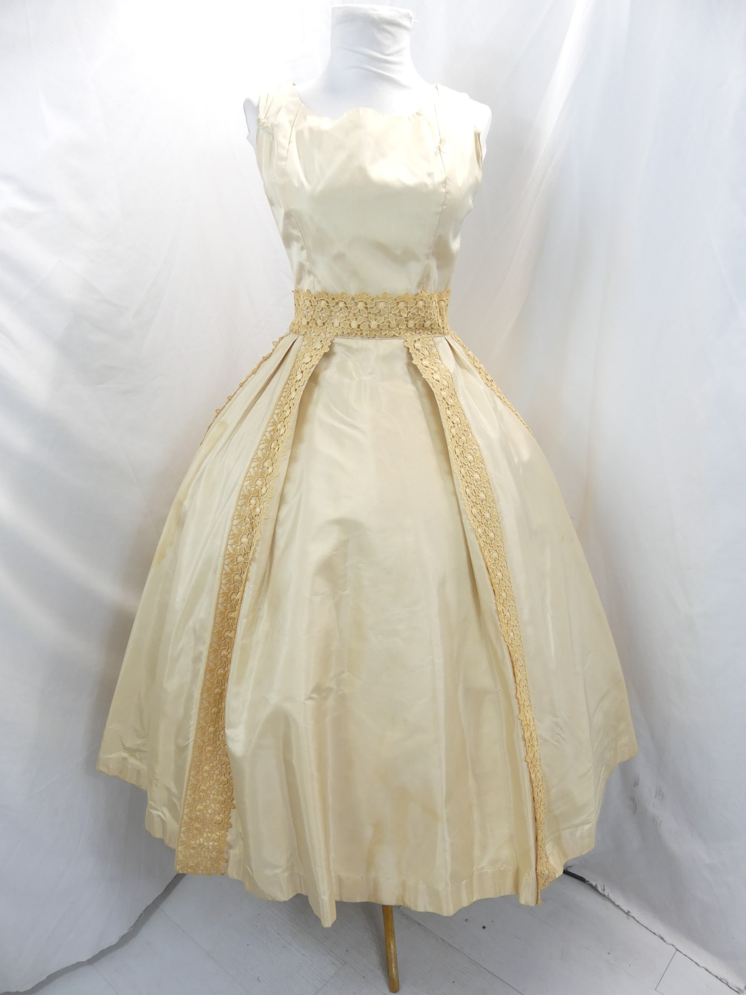 Vintage 1950's Gigi Young Golden Silk Fit & Flare Party Dress with Lace: approx. 36 bust, 26 waist. Has a large water stain & some other small stains. Shoulders were take up & has old repairs at under arms, see photo's