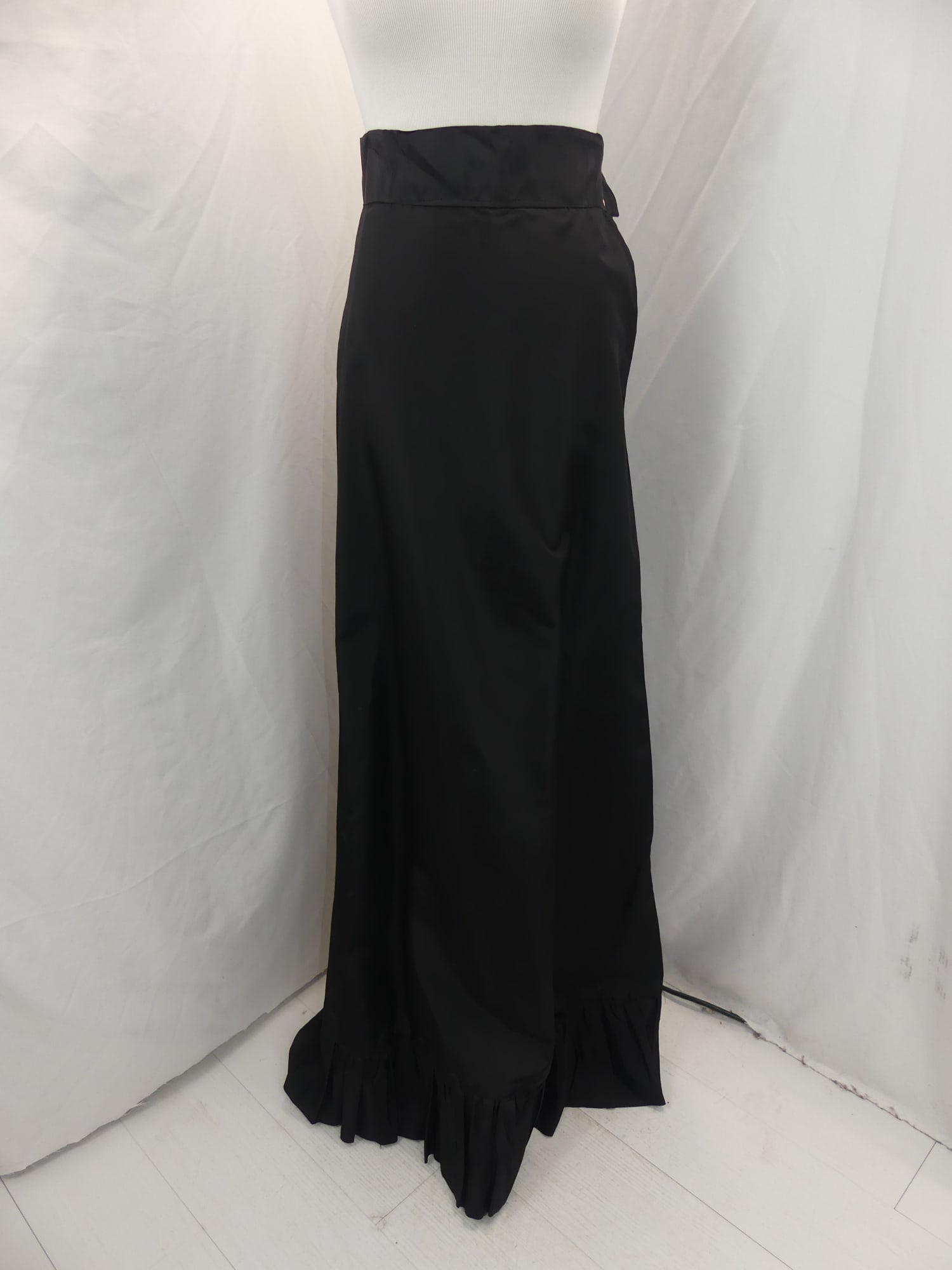 Vintage 1930-40's Black Taffeta Full Length Skirt with Swag Drape in The Back with Ruffle Trim: approx. 24 waist. Has a couple of pin dot holes when you hold up to the light & needs seam repair on the ruffle on the hem. Does not have buttons or closure & some light spots otherwise good condition