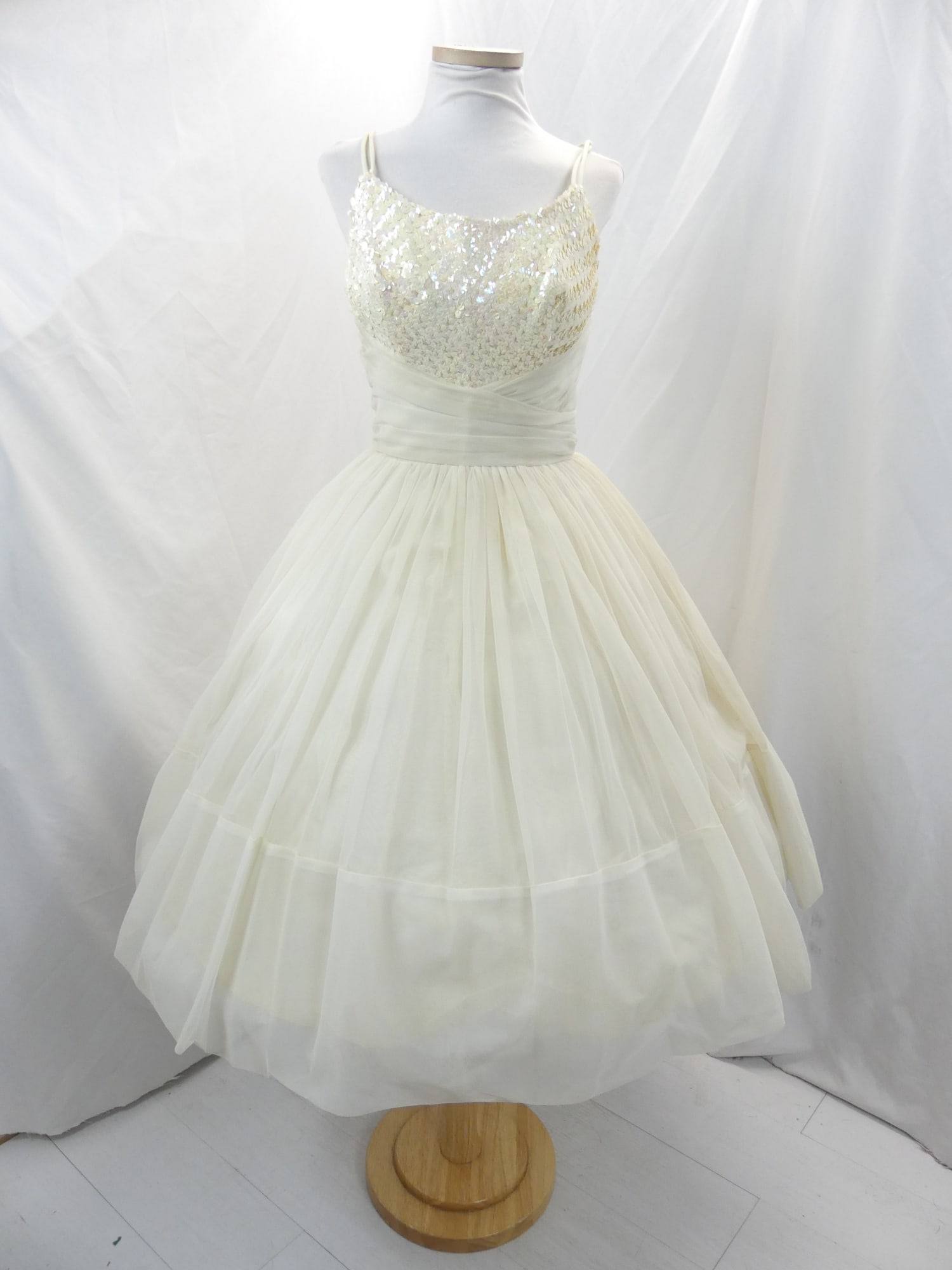 Vintage 1950's Sheer White Party Dress with Iridescent Sequin: approx. 32 bust, 24 waist. Has a couple of small spots on top layer of dress otherwise good condition, see photo's