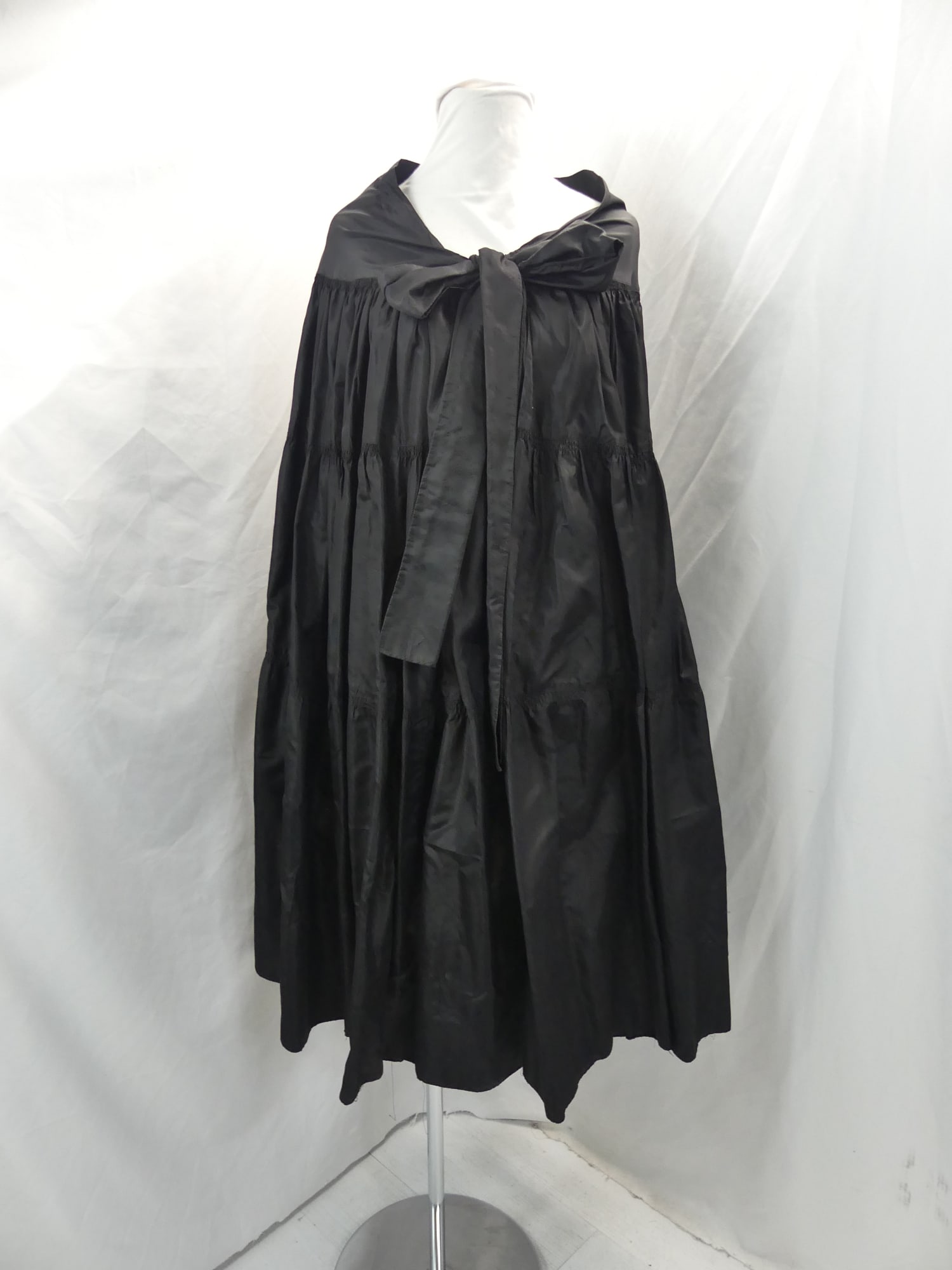 Vintage1950's Black Silk Smocked & Gathered Wrap Skirt: approx. up to 30 waist. Has some small seam splitting at waist, hem was shortened at one point & has been taken down again, also has some small holes, see photo's