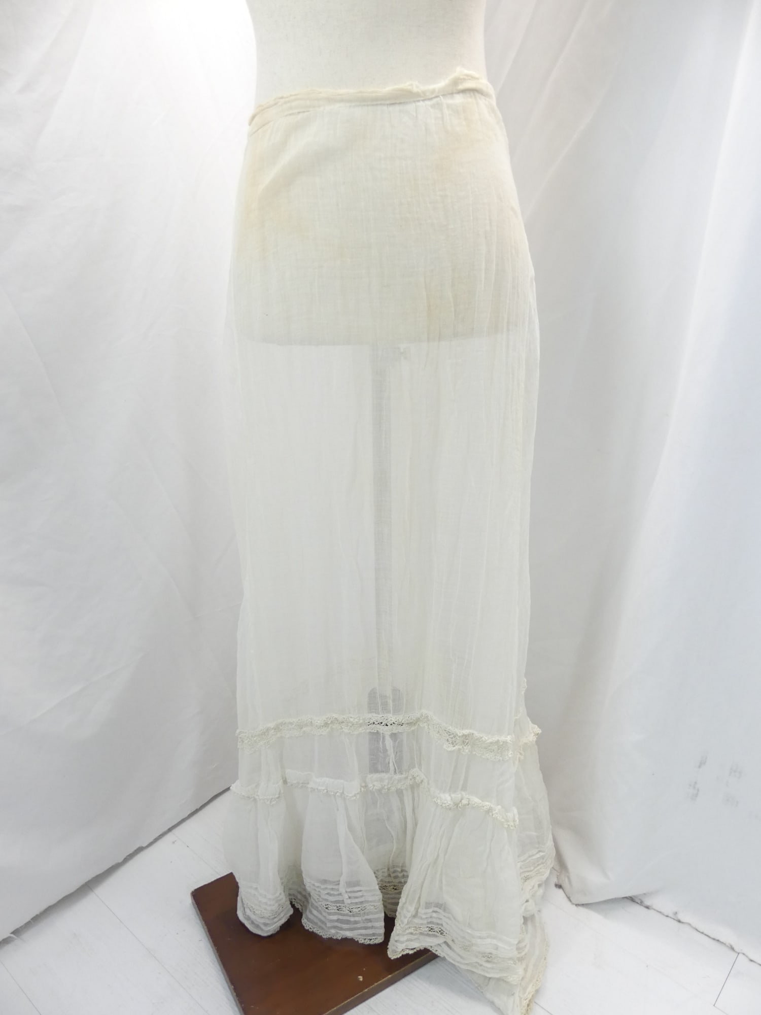 Victorian White Gauze & Lace Bustle Skirt: adjustable waist. Damage at waist, discoloration, pin dot holes & old hole repair, see photo's