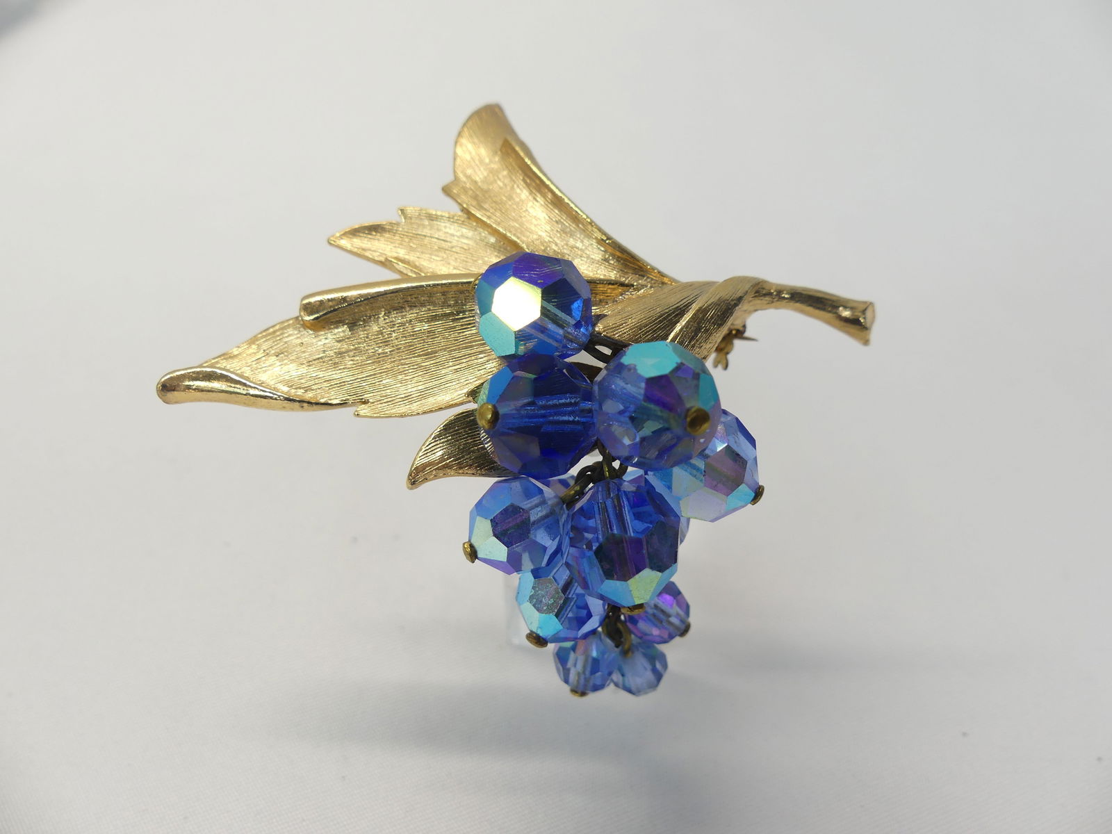 Vintage Gold Tone Grape Leaf Brooch with Blue Iridescent Cut Crystal Grapes (1 of 3)