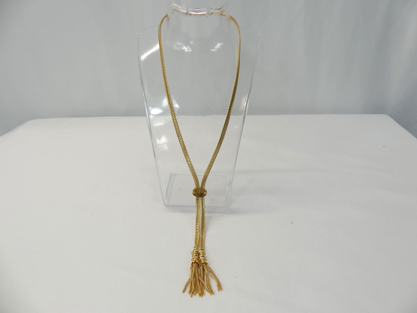 Vintage Monet Gold Tone Slide Necklace: approx. 23 inches, see photo's