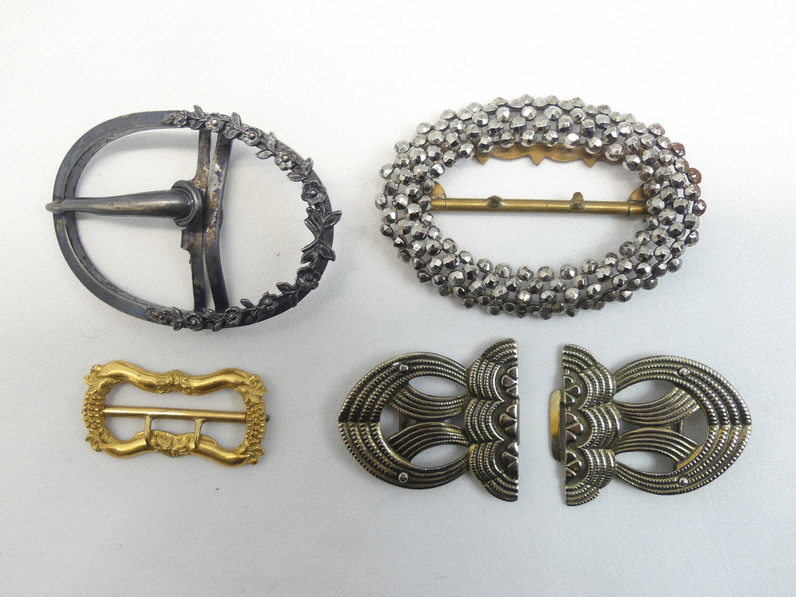 Lot of 4 Antique Dress Buckles: see photo's