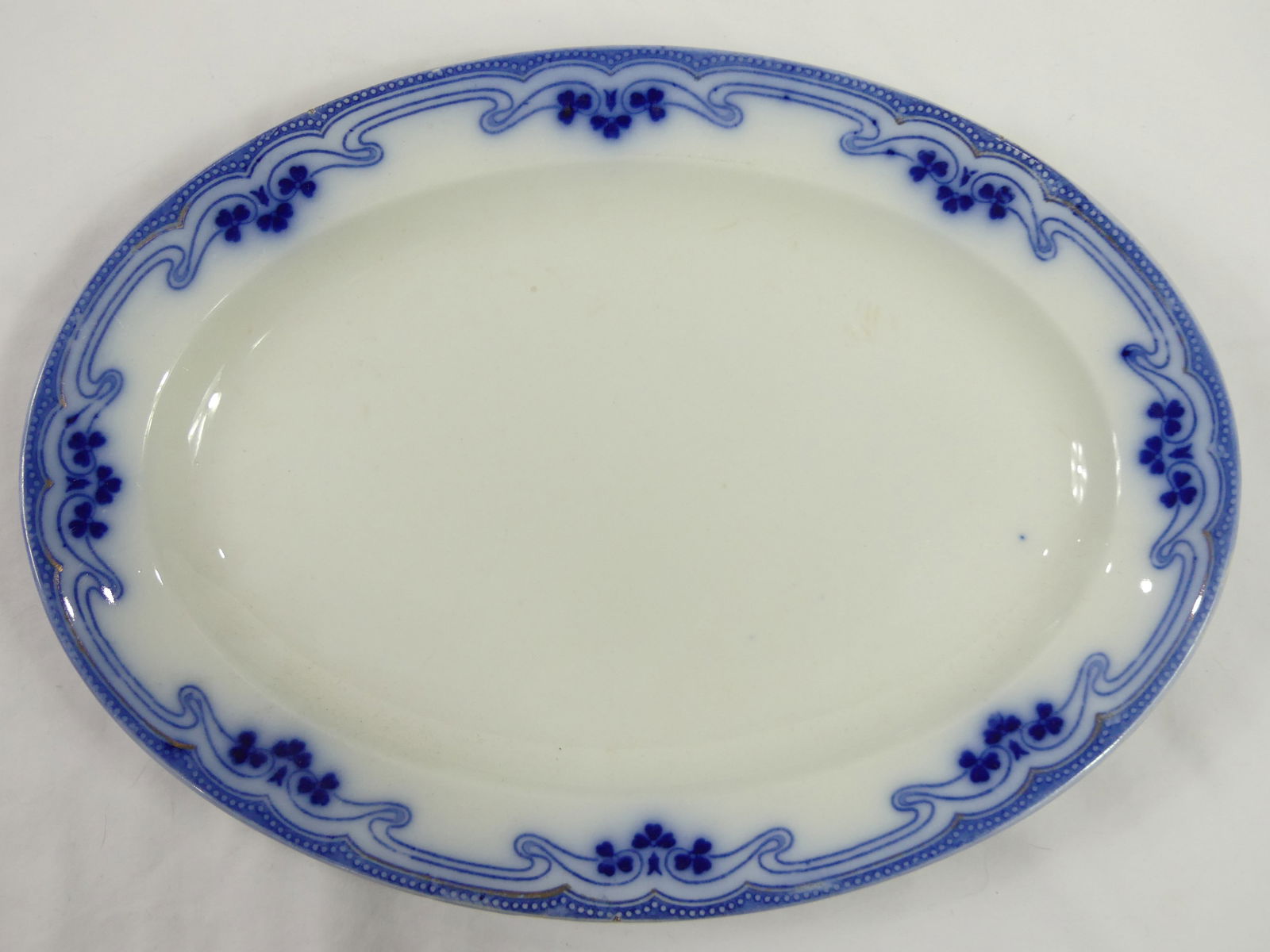 Antique W.H. Grindley Flow Blue Plater with Clovers (1 of 6)