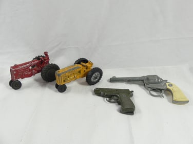 Lot of 2 Toy Cap Guns, & 2 Tractors, Hubley, Nichols, Big Chief & MM