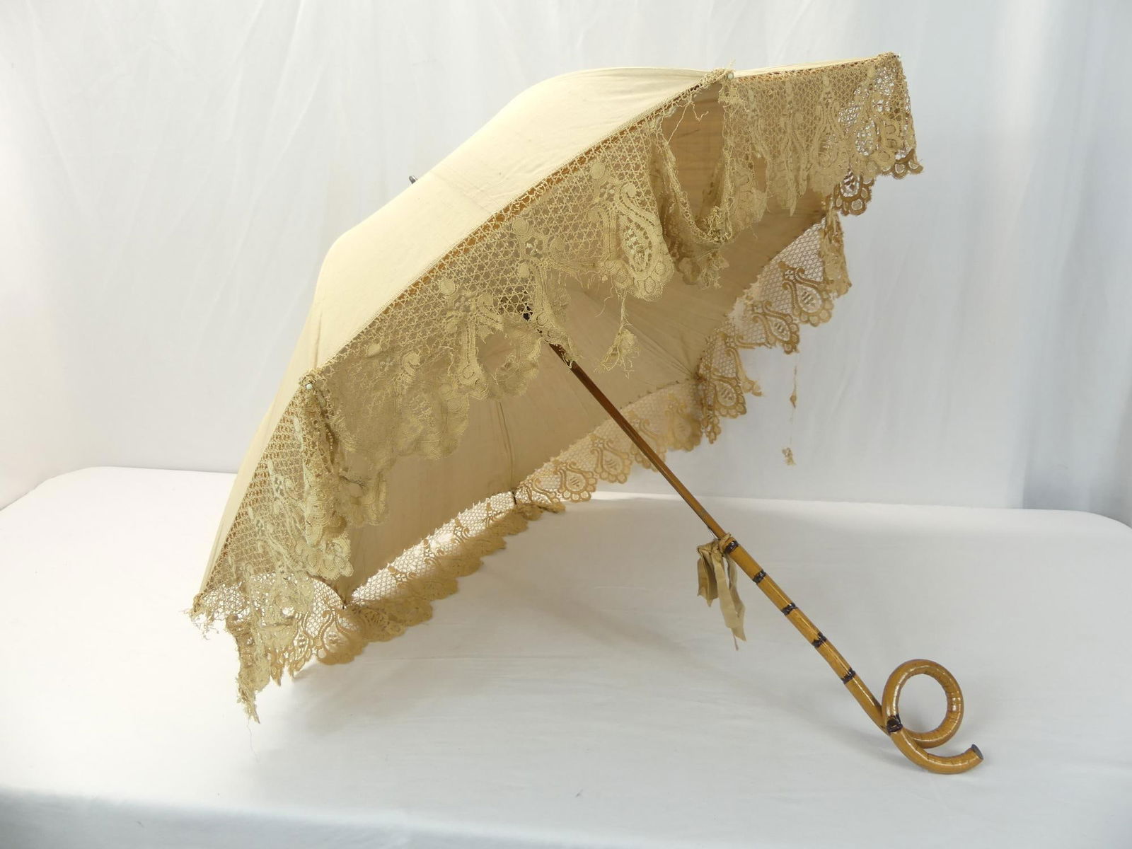 Antique 1880's Beige Silk & Lace Parasol with Twisted Bamboo Handle: approx. 36 inches tall, see photo's