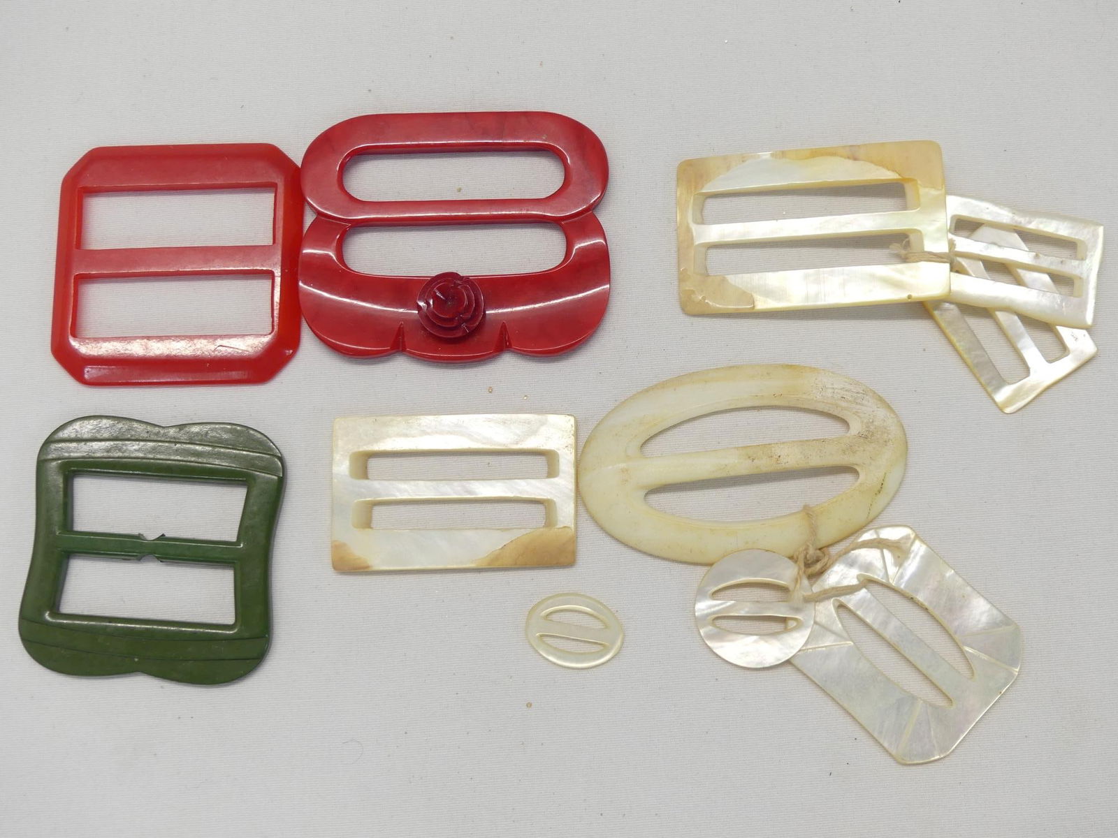 Lot of 11 Vintage Mother of Pearl, Bakelite & Other Dress Belt Buckles: see photo's