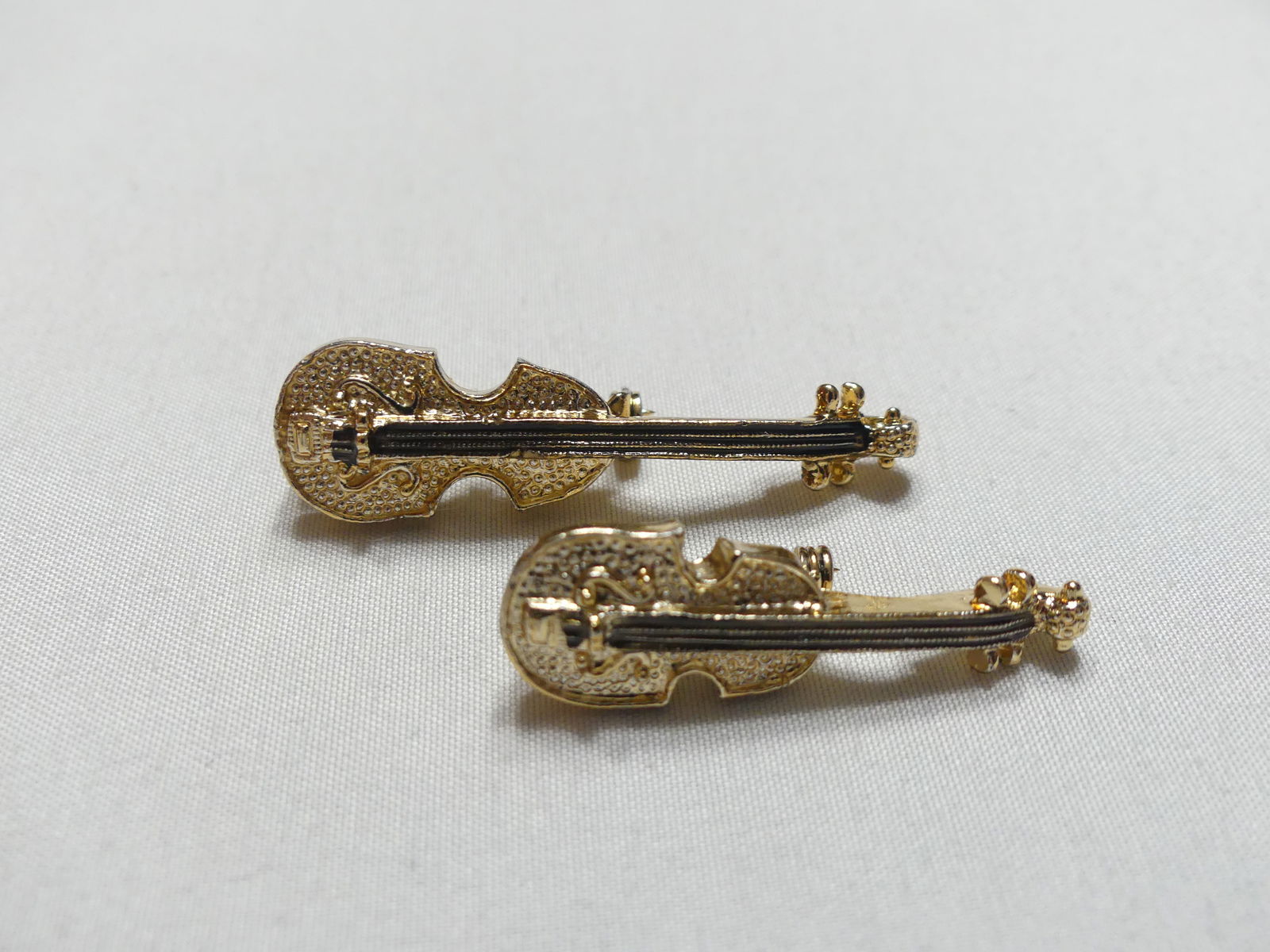 Two Gold Tone Violin Brooches Stamped JERRY'S: approx. 1.5" & other 2", see photos