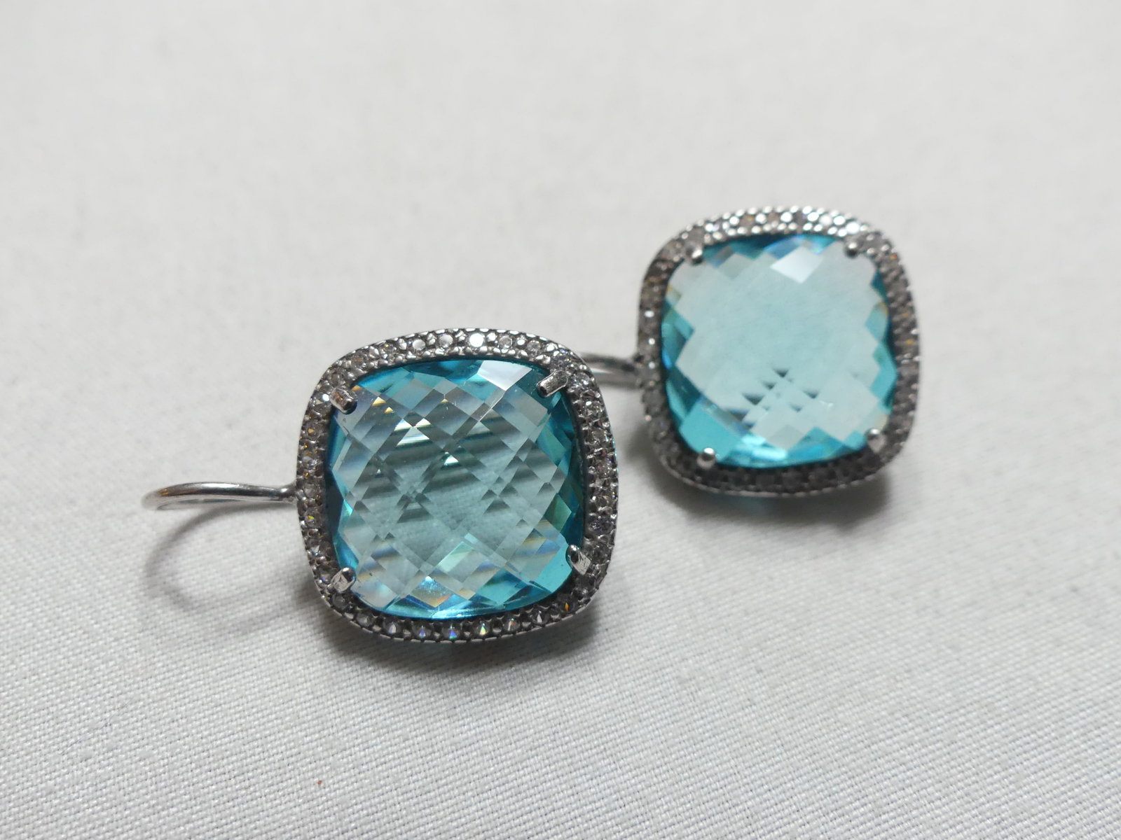 Sterling Silver Topaz Earring: Cushion cut topaz in sterling stamped "925, Italy", approx 0.5"