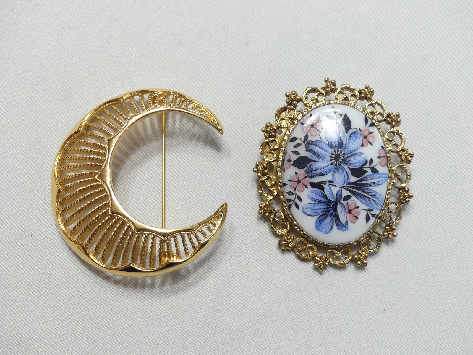 Two Vintage Gold Tone Brooches: one 2.25", one 1.75" x 2"