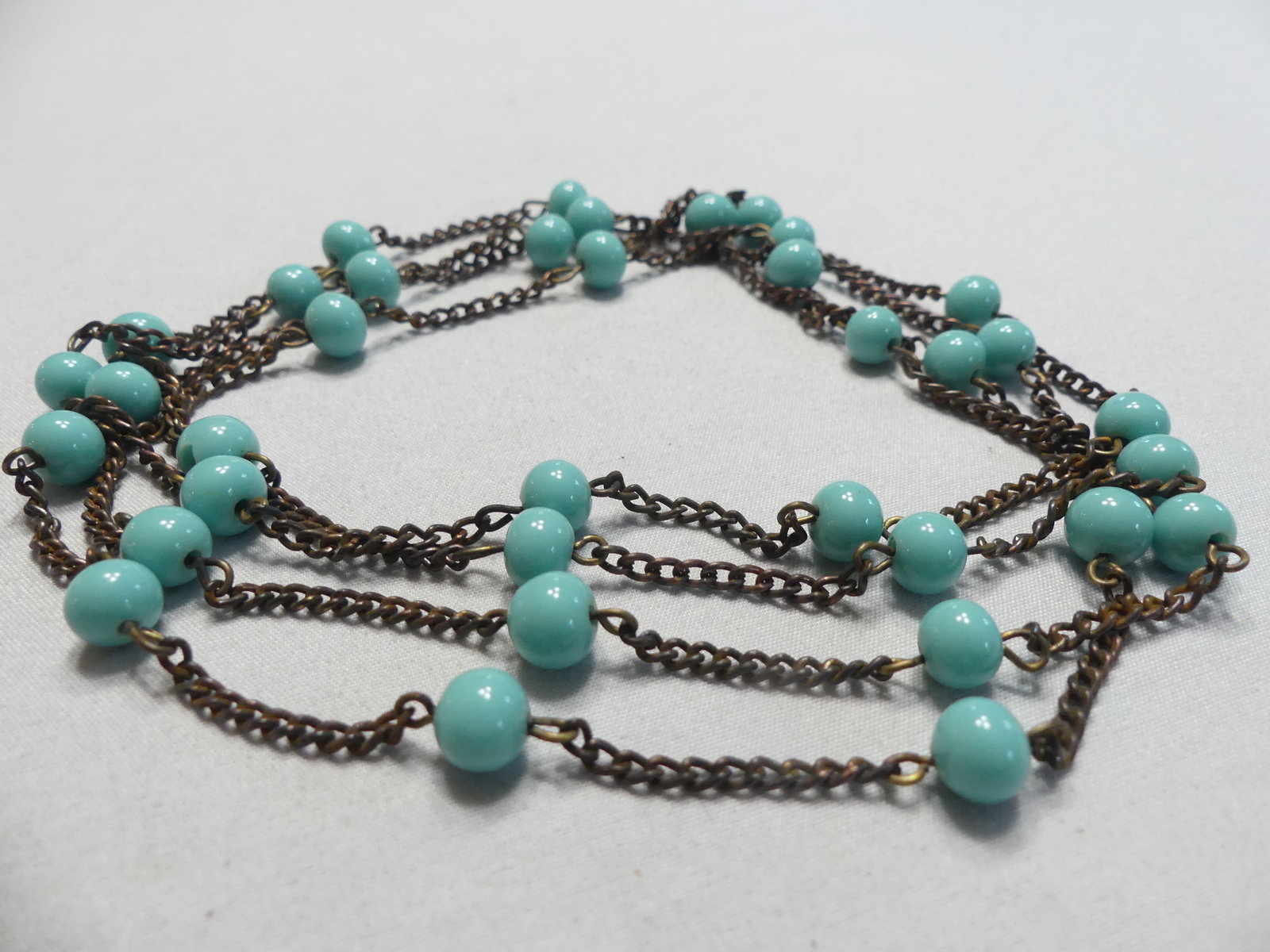 Antique Turquoise Glass Beaded Necklace: Makes a nice double strand, approx. 54" some tarnish, see photos