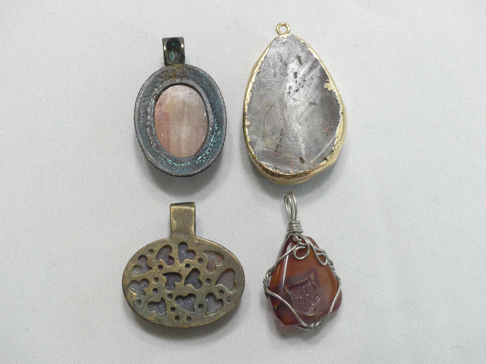 Four Hard Stone Pendants - 2
